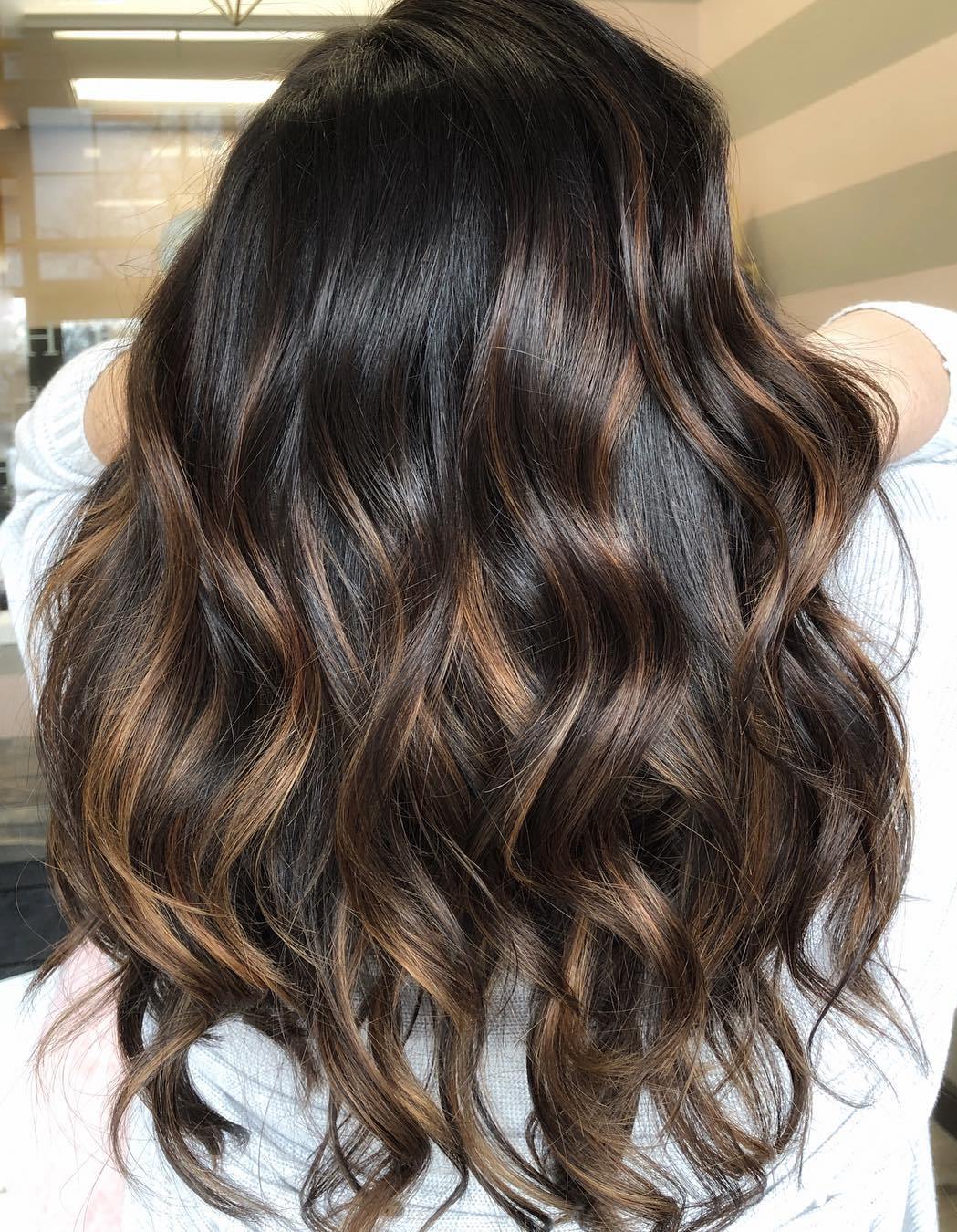 natural dark brown hair with highlights