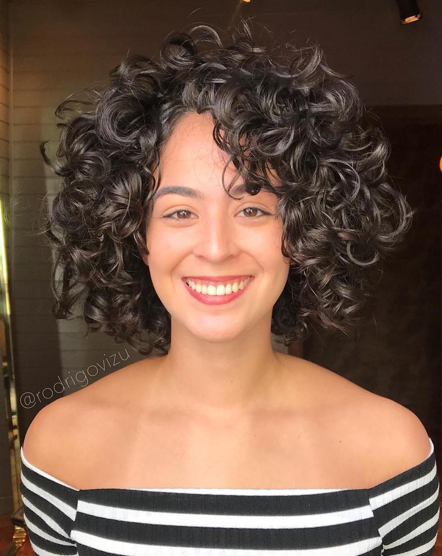Voluminous Bob With Curls For A Long Face
