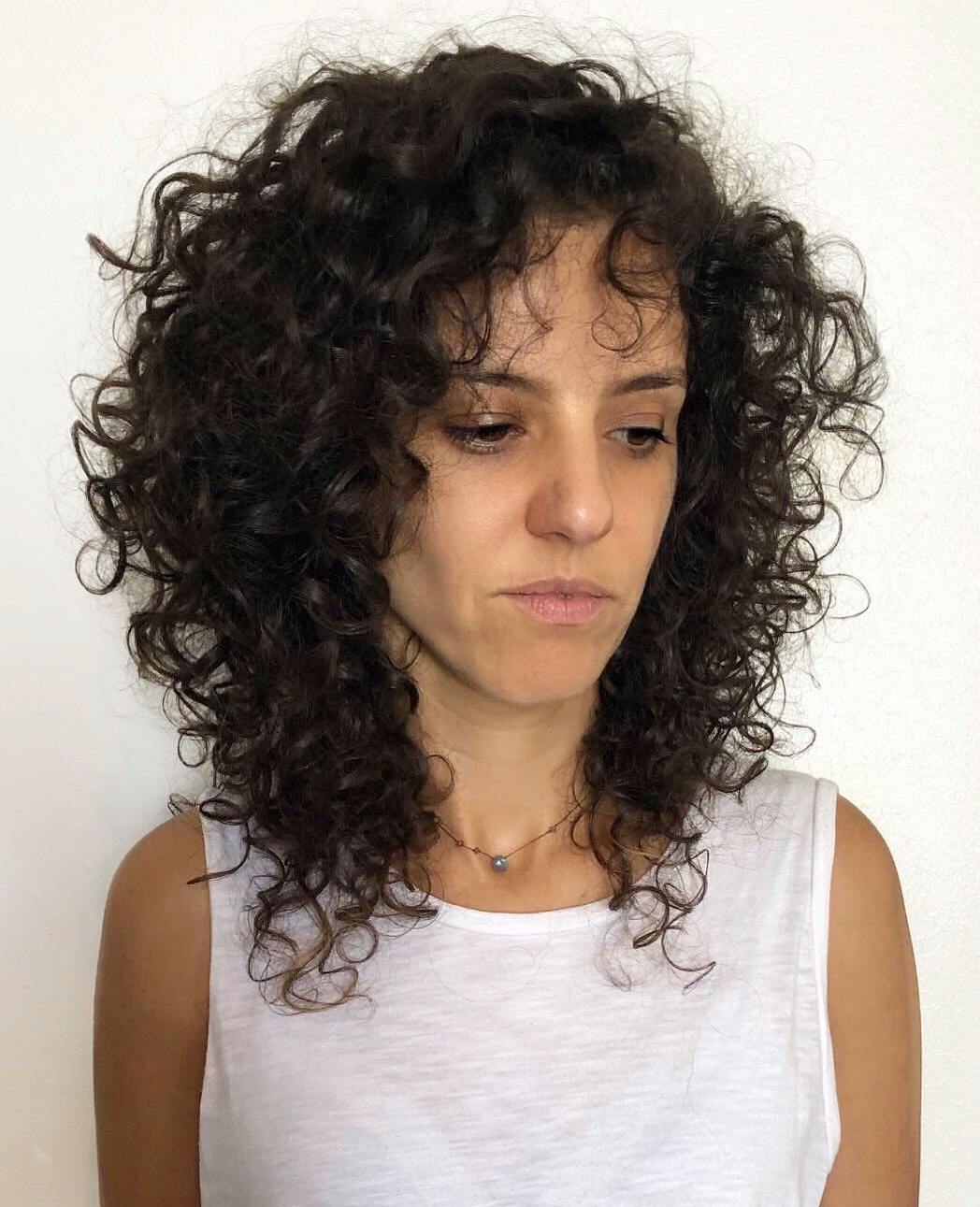 Curly Lengthy Cut For Long Faces