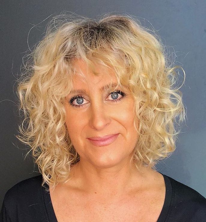 Medium Wavy Blonde Hairstyle Over 50