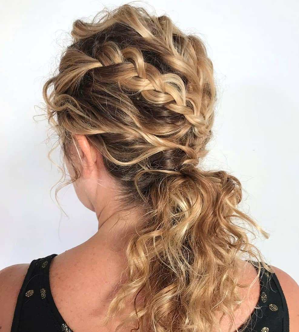 Low Messy Ponytail With Braids