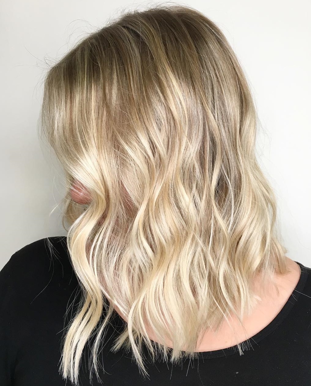 Shiny Blonde Wavy Lob