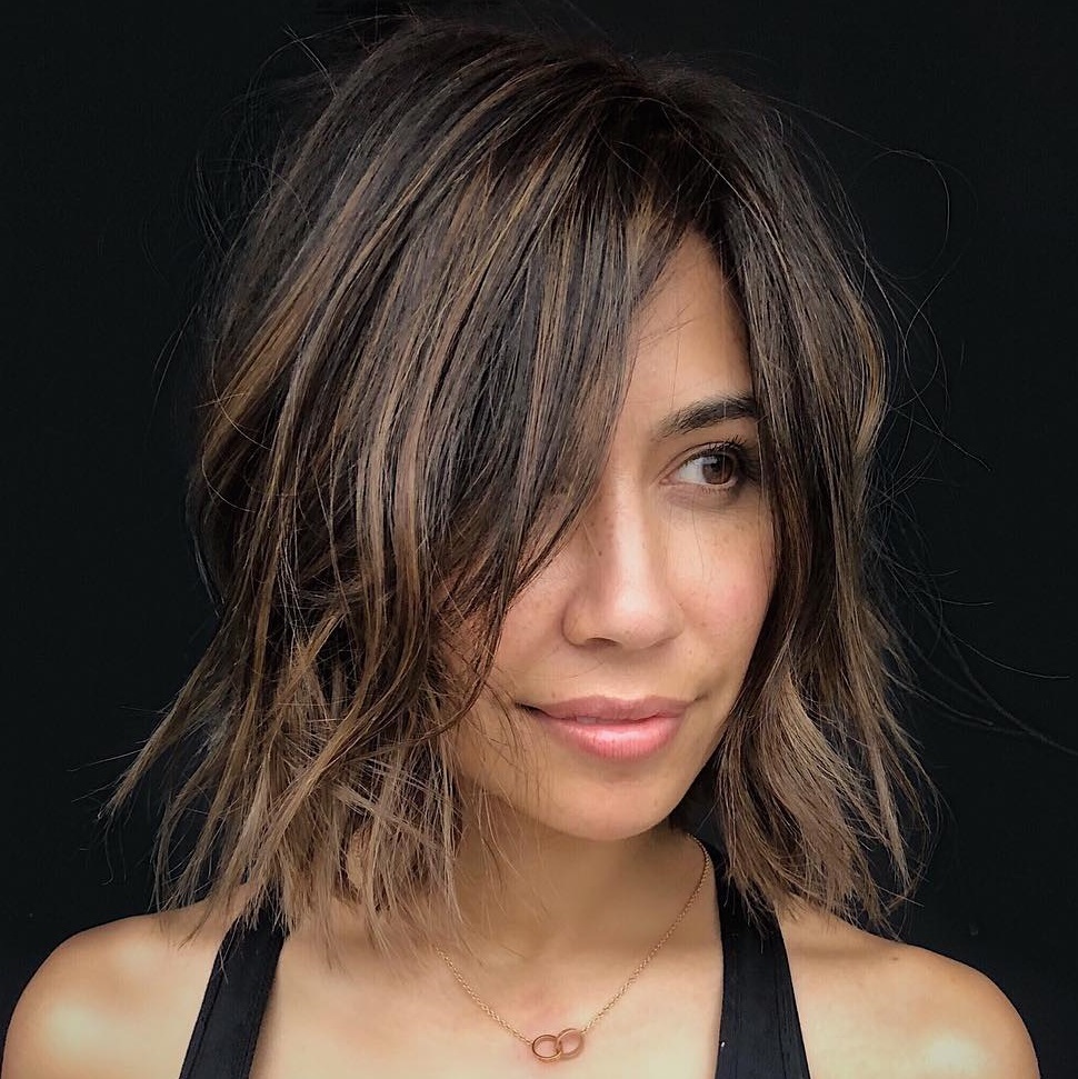 30 Flattering Hairstyles for Long Faces You'll Want to Try in 2022