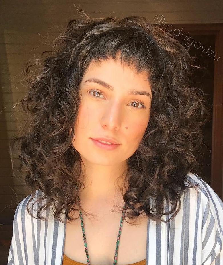 Mid-Length Wavy Hair With Shorter Bangs