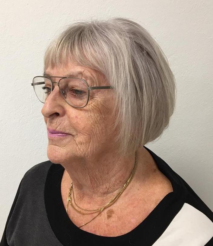 Older Women's Bob With Bangs And Glasses