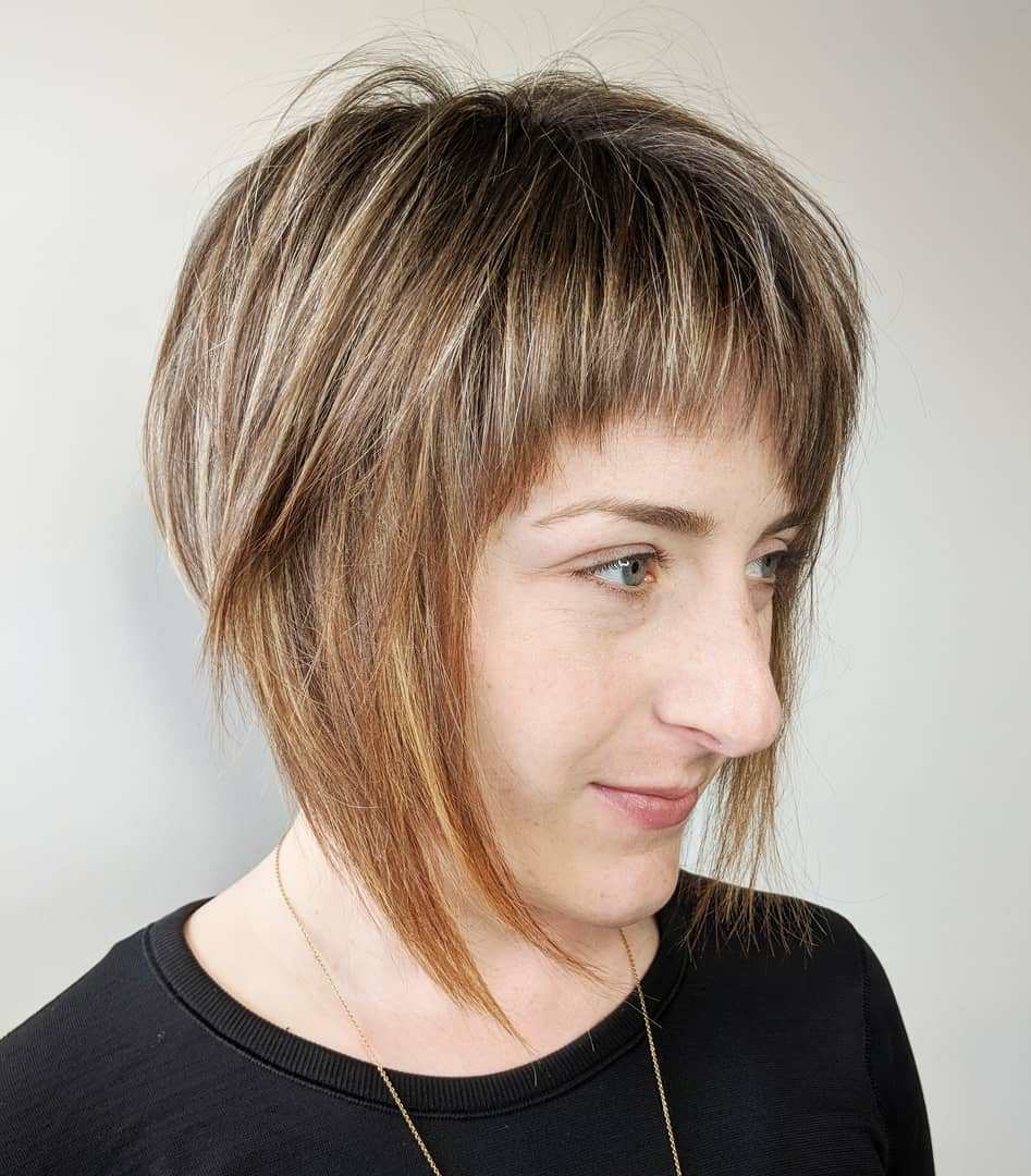 Angled Razored Bob With Arched Bangs
