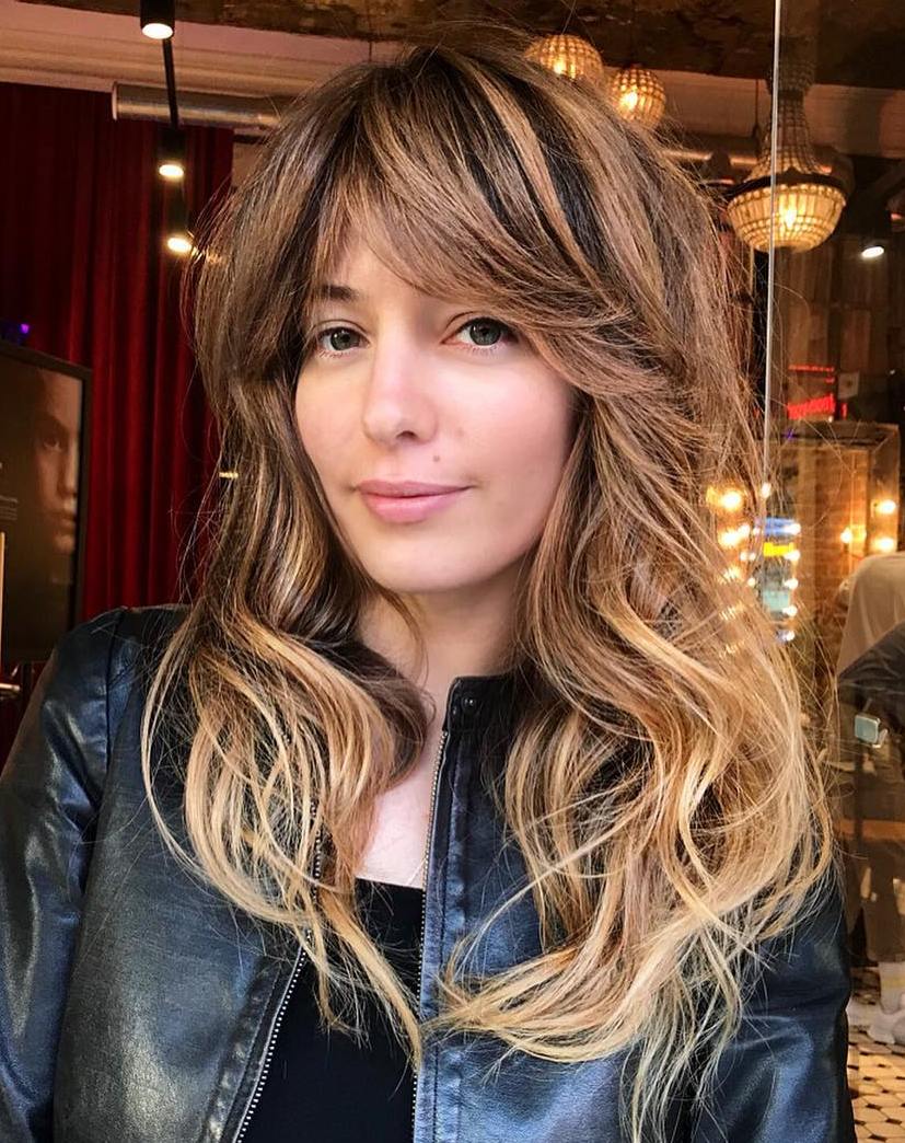 Wavy Long Hairstyle With Swoopy Bangs