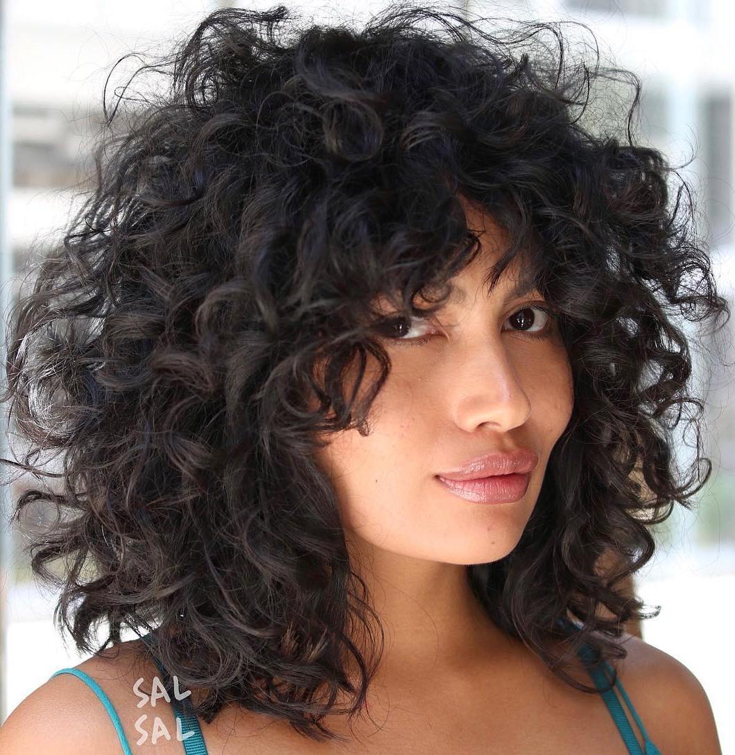 Mid-Length Messy Curly Layered Hairstyle
