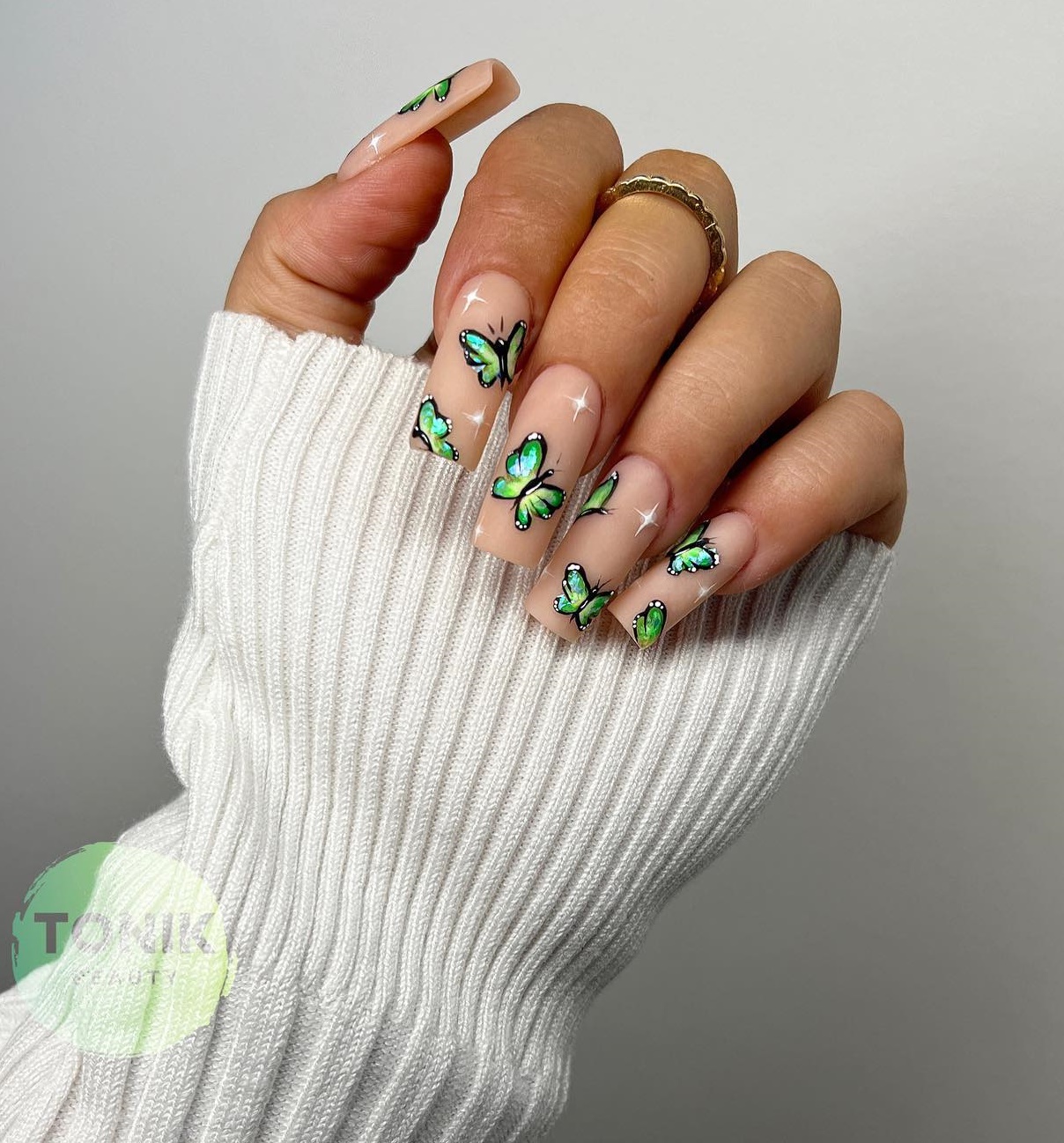 Acrylic Nails with Green Butterfly Design