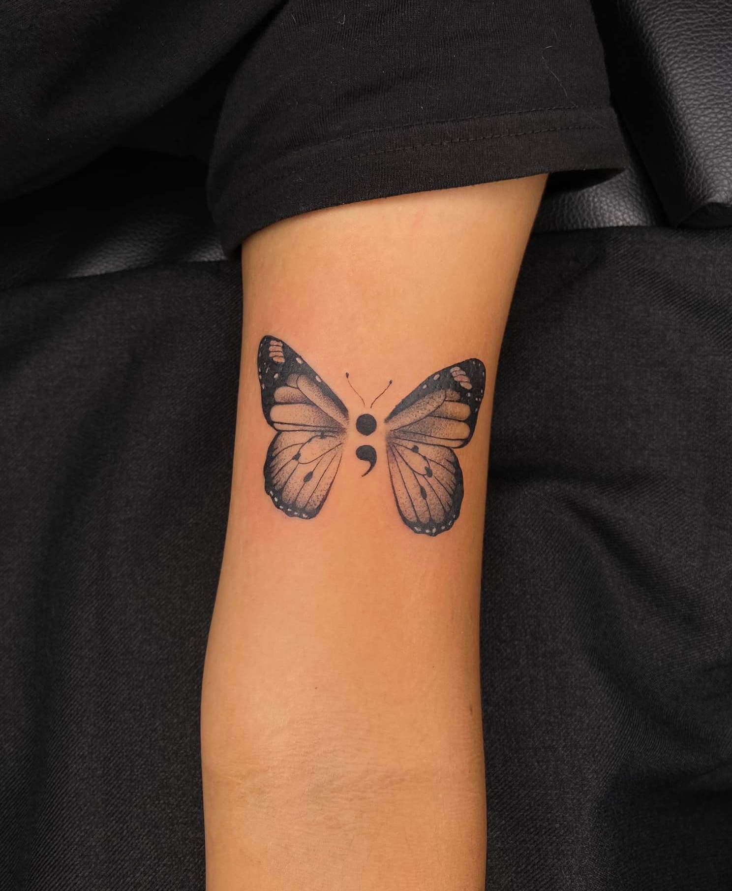Butterfly Semicolon Tattoo on Arm