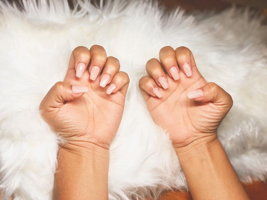 Classy nude nail design with cream polish