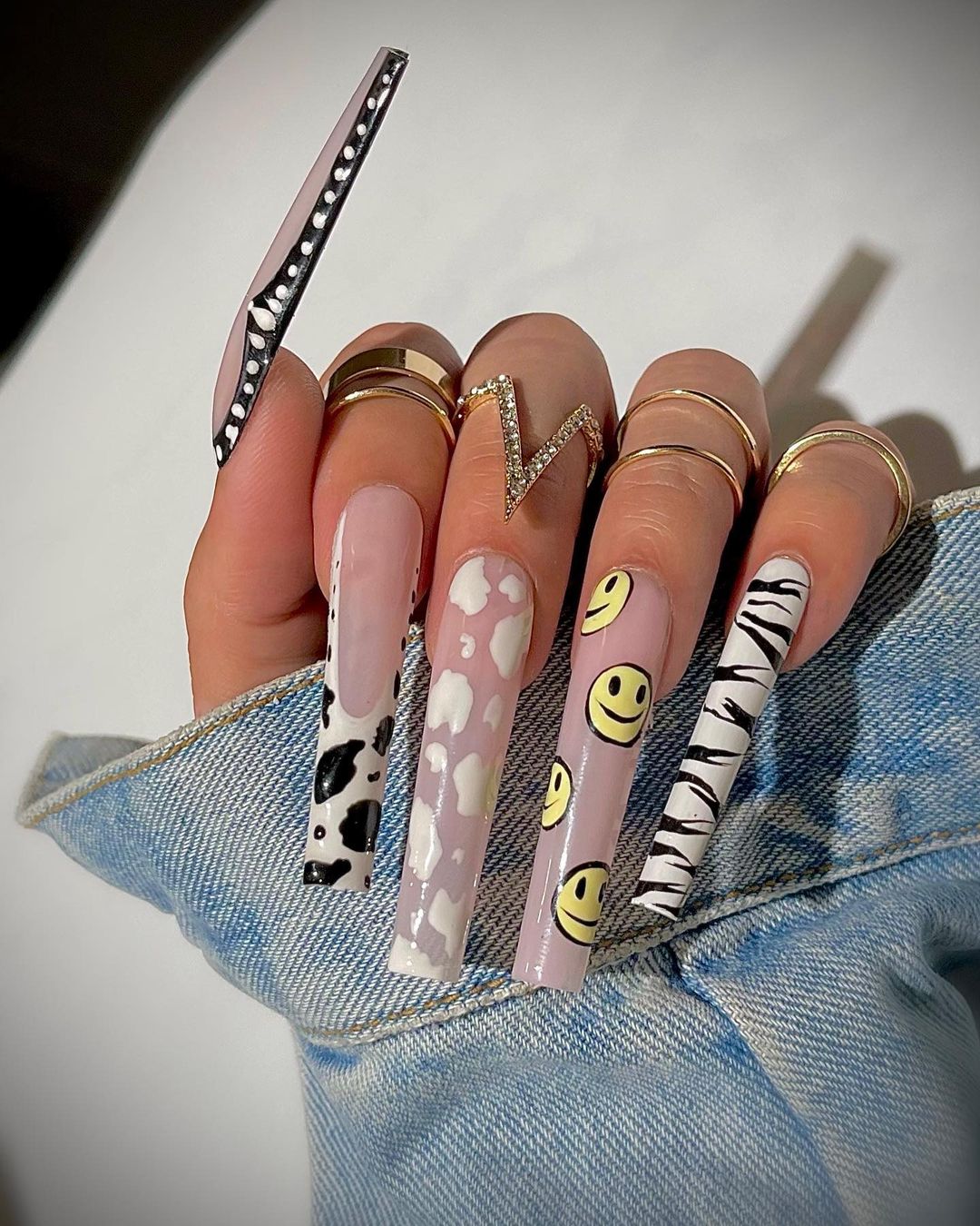 Long Acrylic Nails with Black and White Cow Print