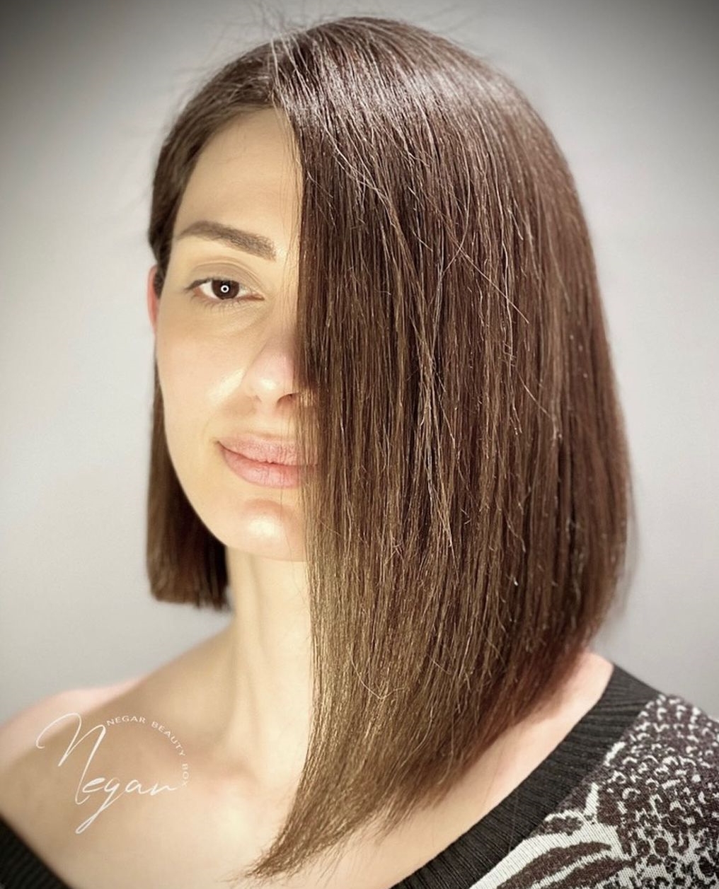 Long Asymmetrical Bob on Straight Brown Hair