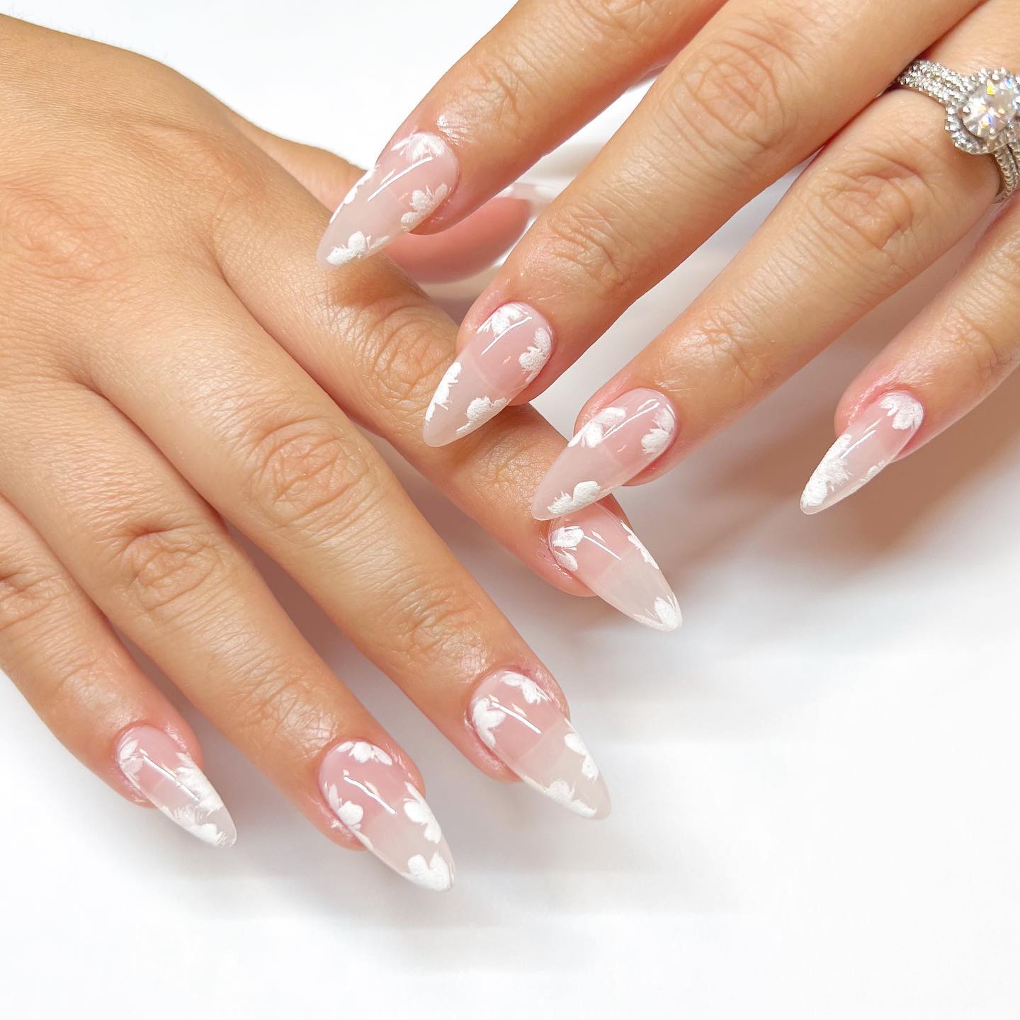 Short Stiletto Nails with White Flowers Design