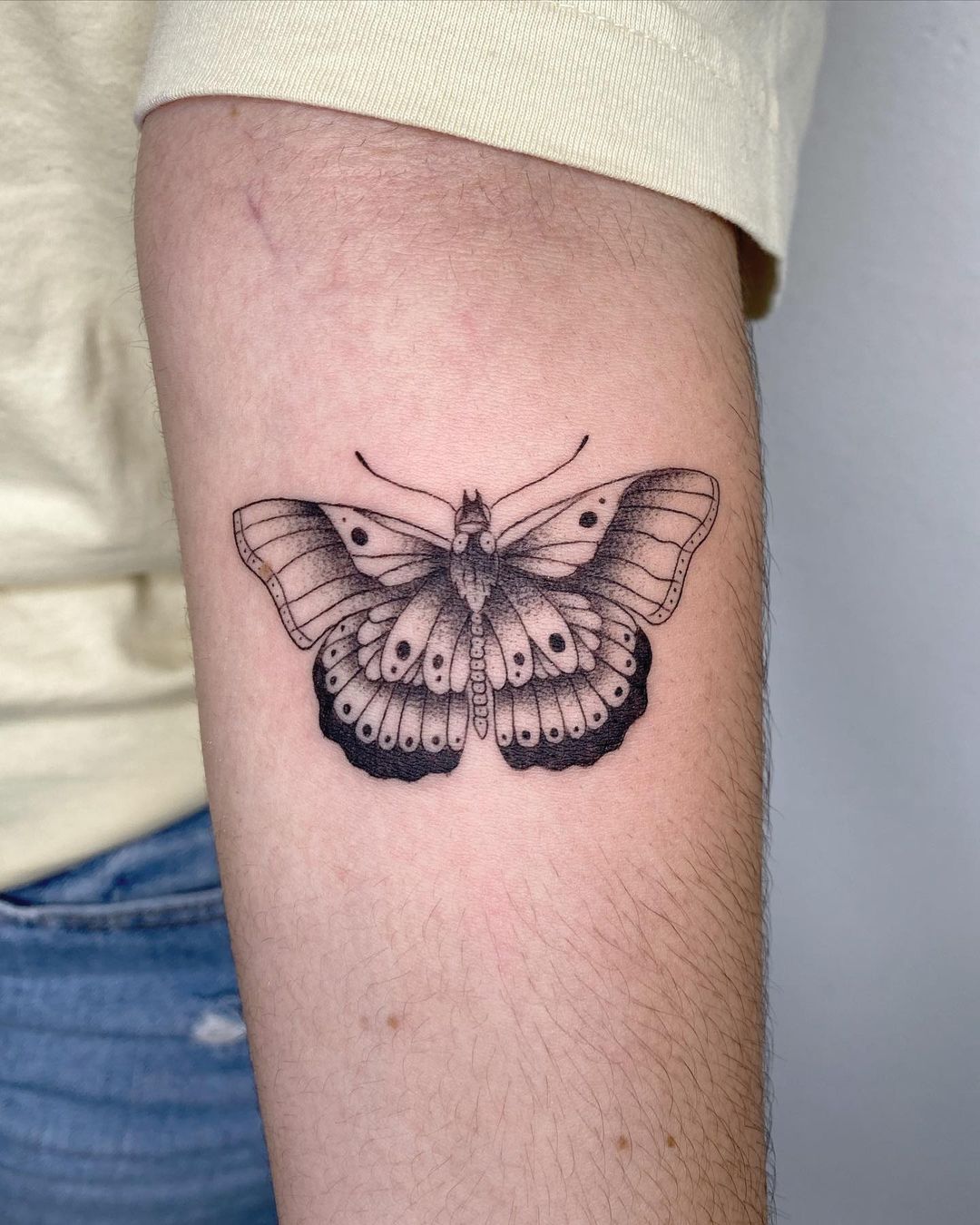 Black and White Harry Style Butterfly Tattoo on Arm