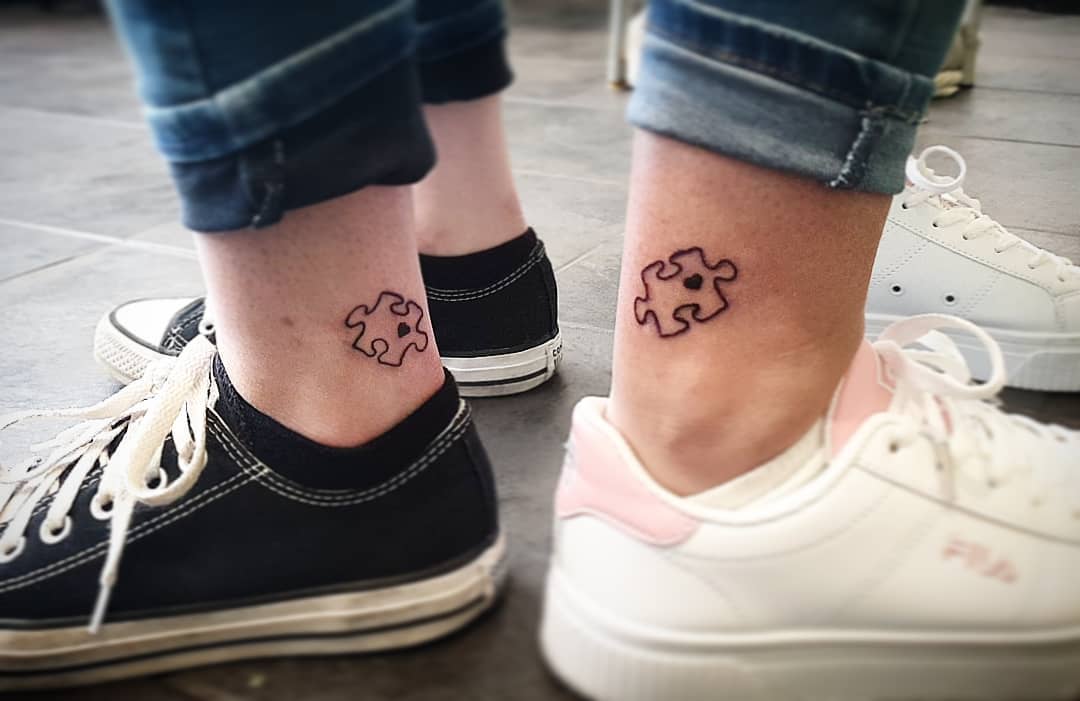 Couple Puzzle Piece Tattoo For A Quirky And Youthful Feel