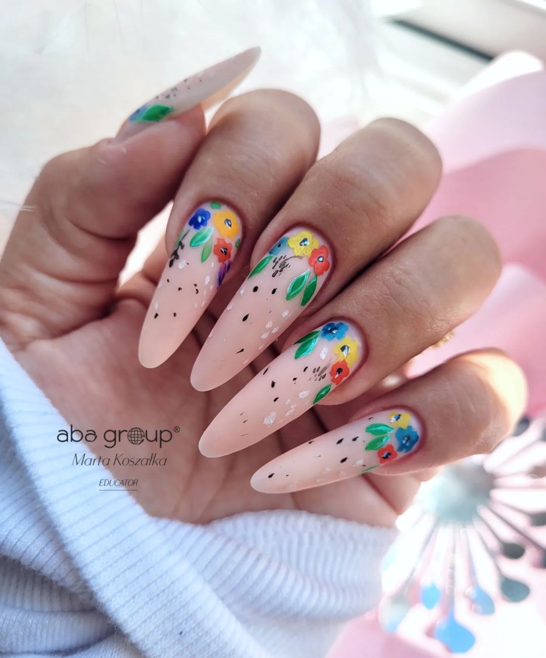 0Long Nude Almond Nails with Floral Design