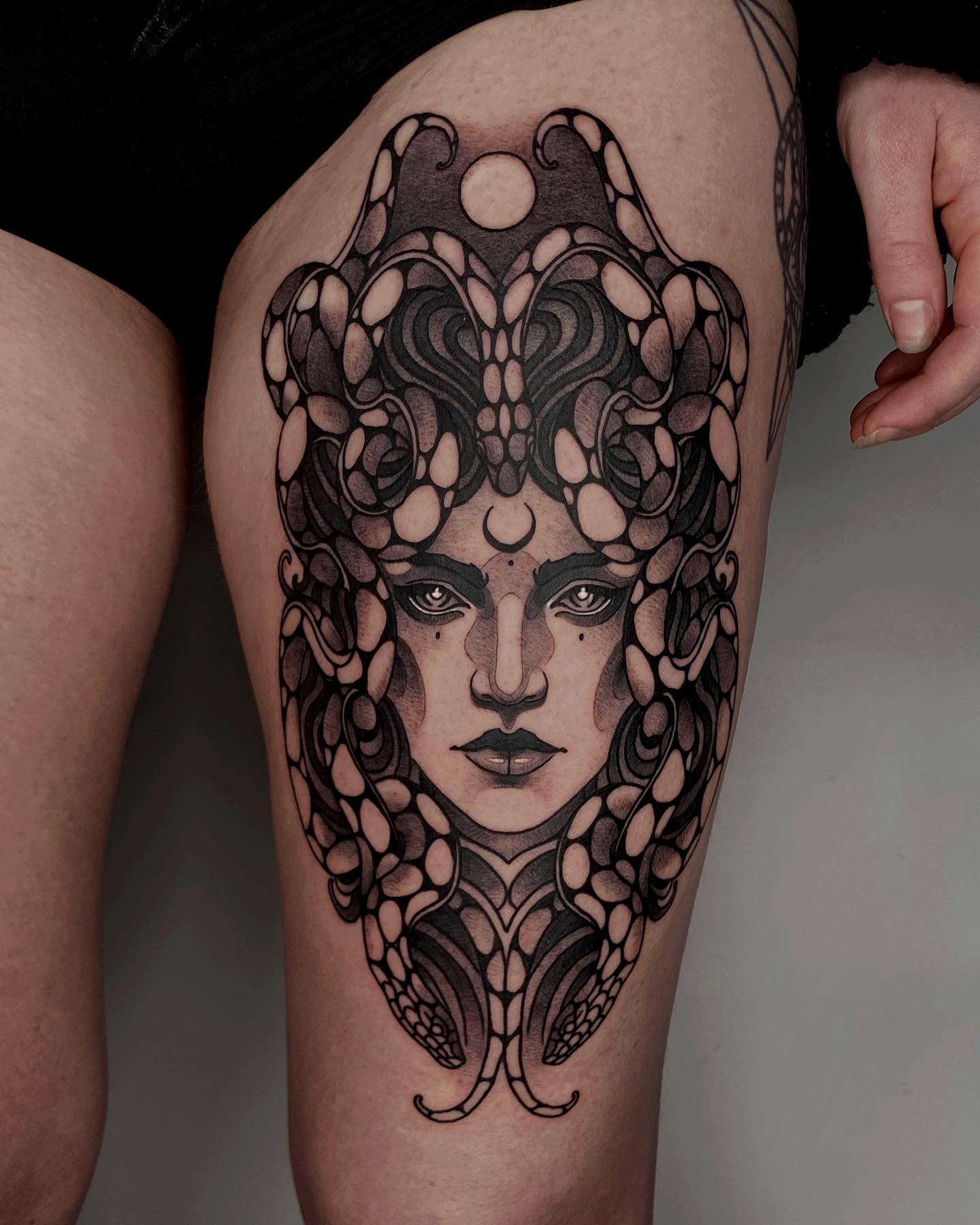 Medusa Tattoo on Front Thigh