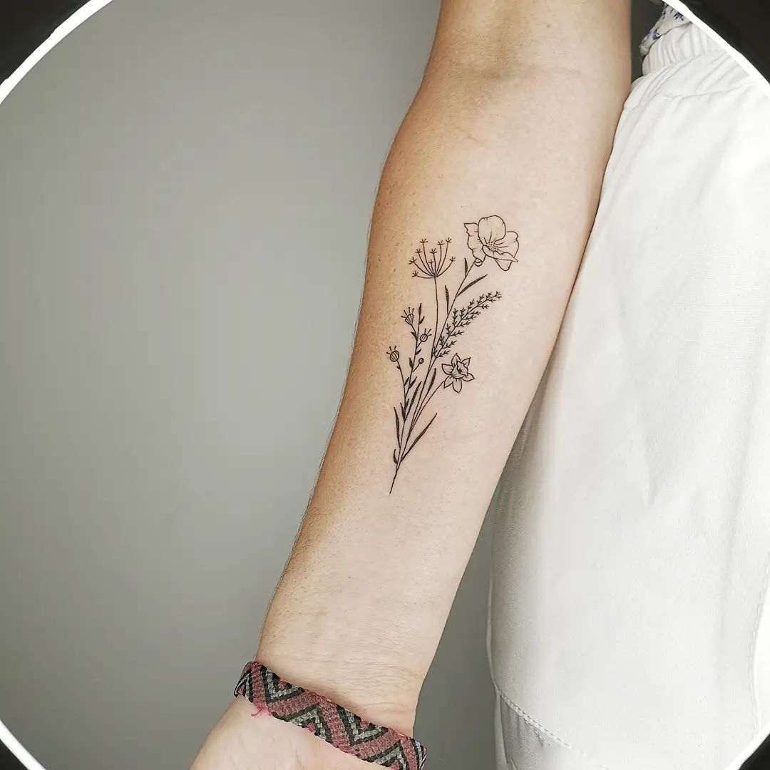 Minimalist Blossoming Flower Tattoo