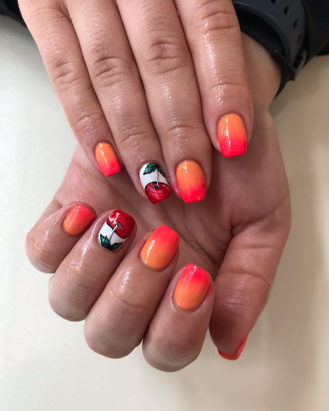 Orange Ombre Nails with Cherry Design