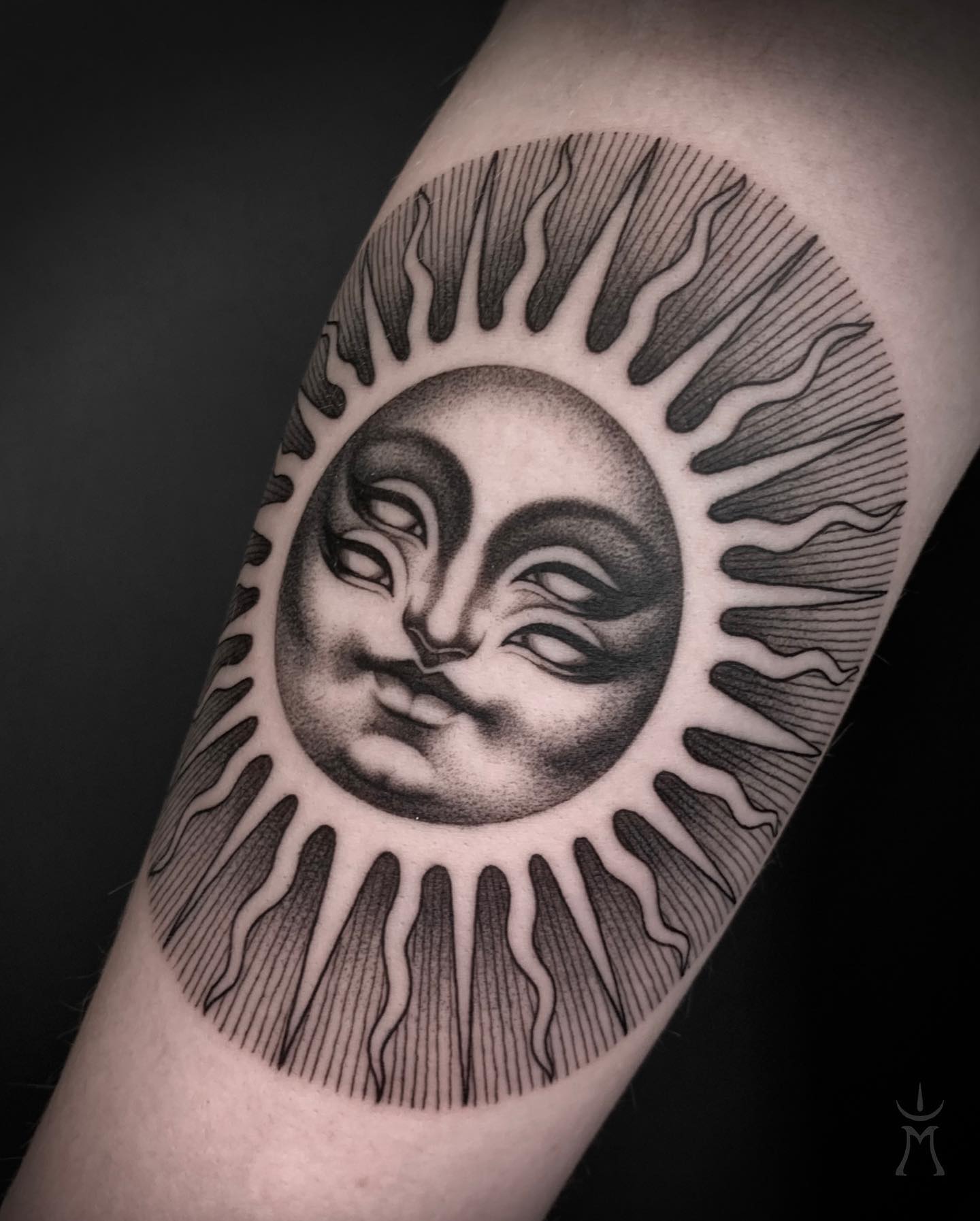Sun with Double Face Tattoo on the Back of the Leg