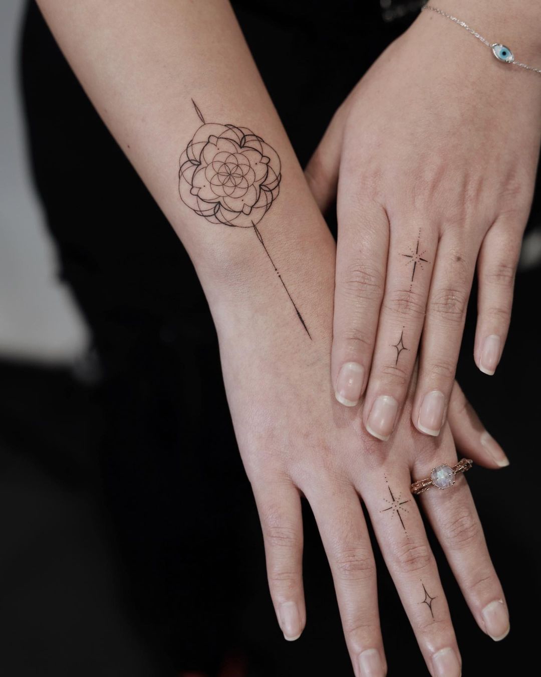 Black and White Flower of Life Tattoo on Wrist