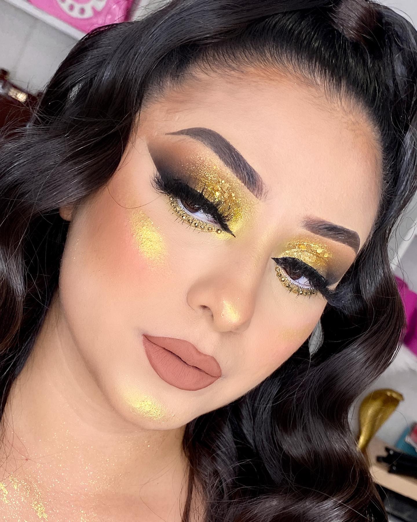 Gold Makeup with Rhinestones and Nude Lipstick