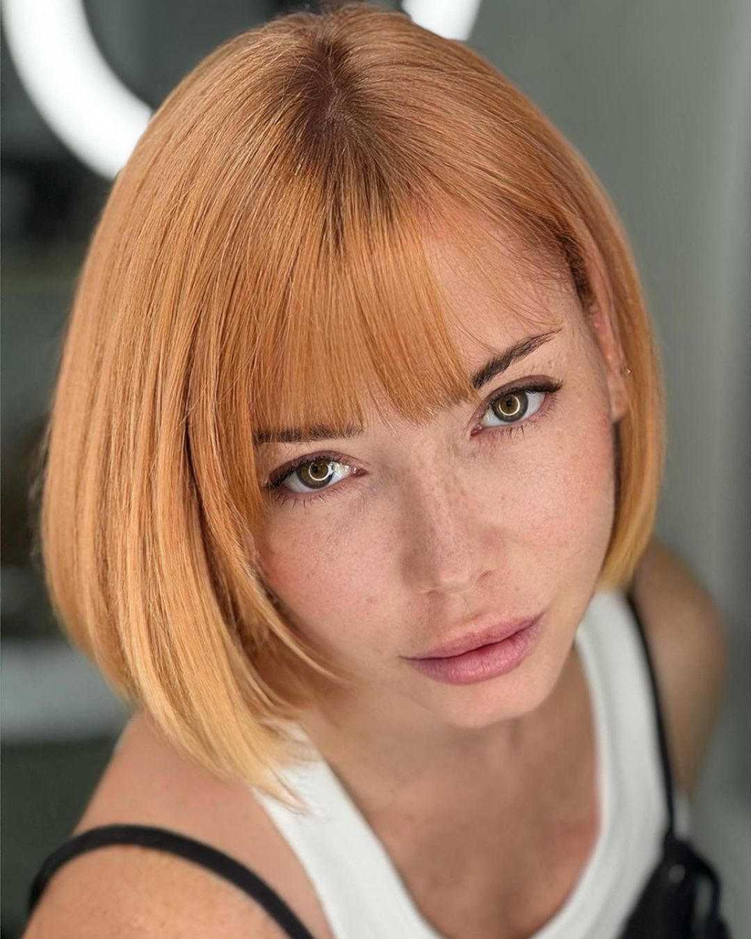 Light Strawberry Blonde on Short Bob Cut