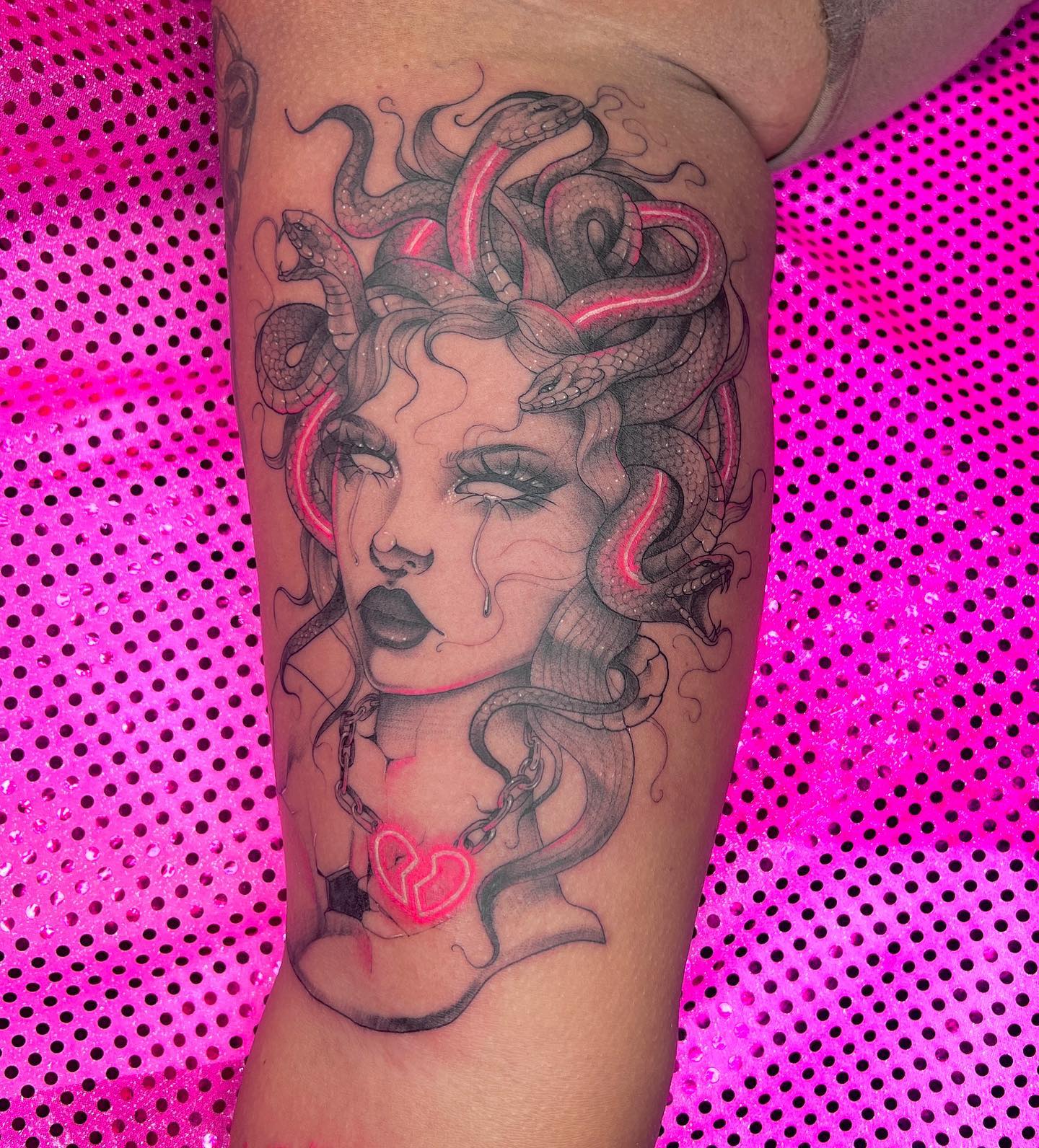 Neon Pink Medusa Tattoo on Arm