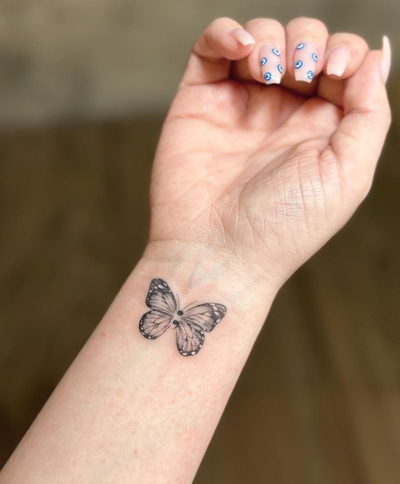 Small Semicolon Butterfly Tattoo on Wrist