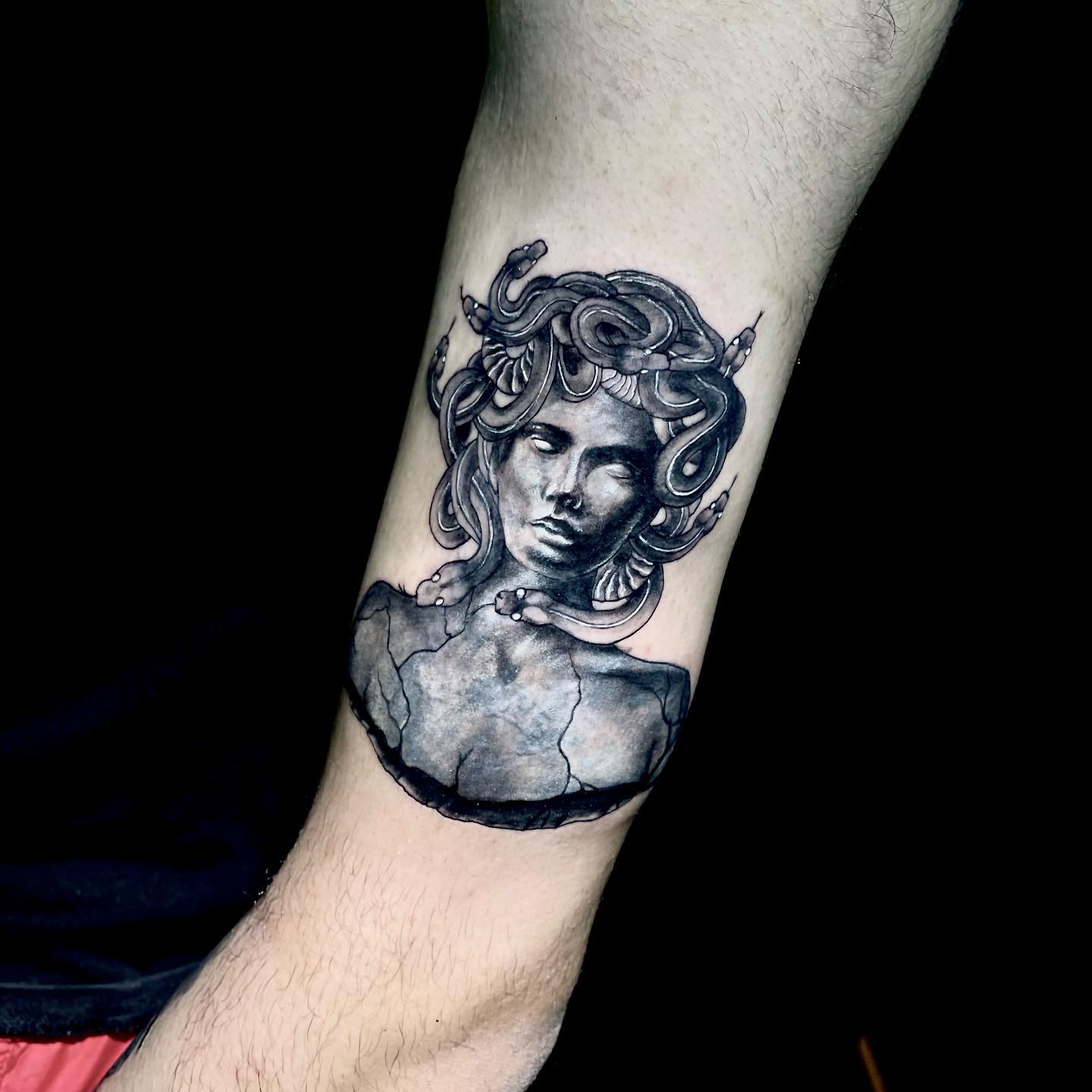 Medusa Statue Tattoo on Arm
