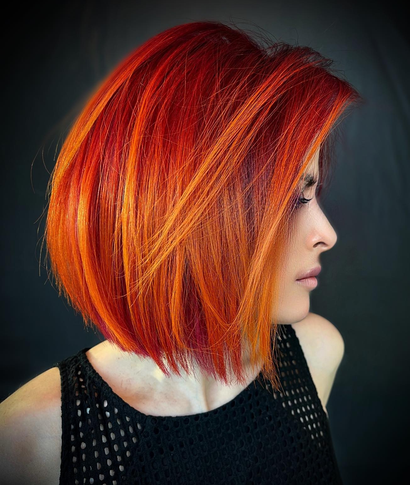 Red Hair with Lowlights on Short Bob Cut