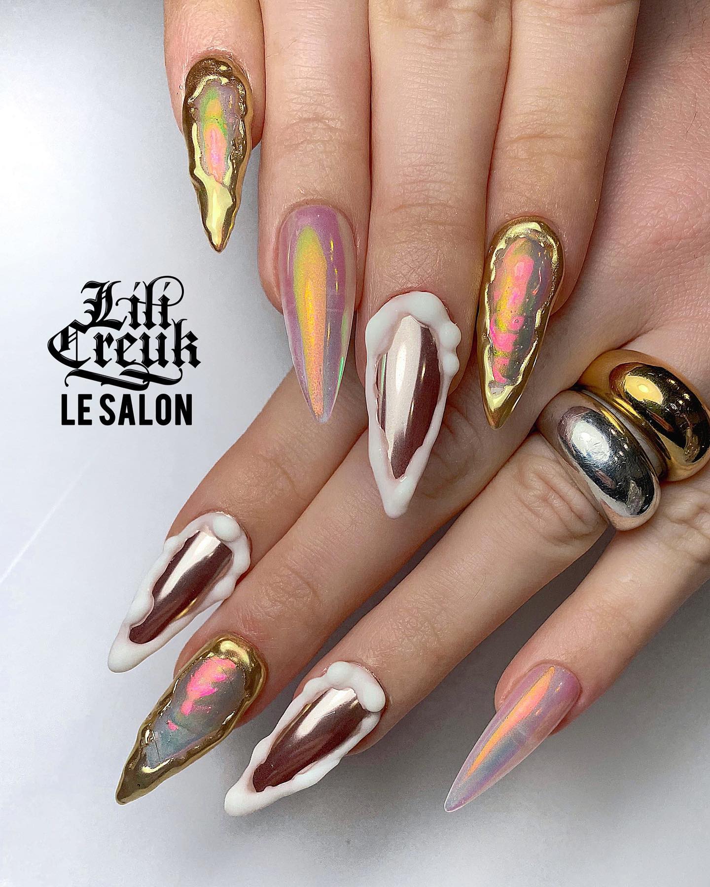 Stiletto Gold Chrome Nails with Design