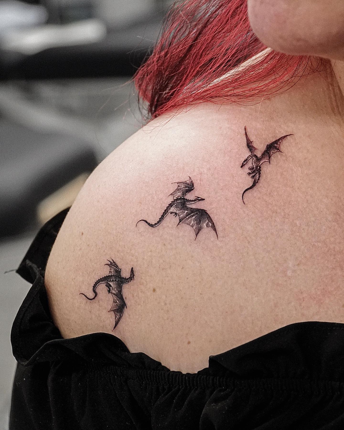 Three Small Dragons Tattoo on Shoulder