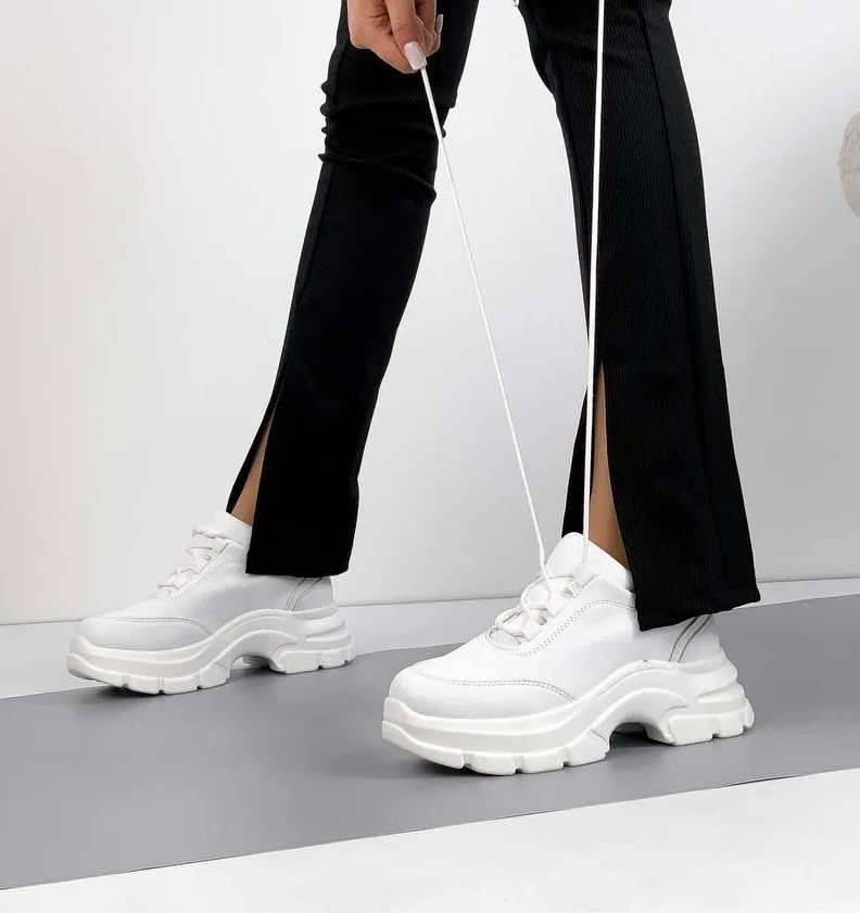 White Leather Sneakers with Classy Black Trousers