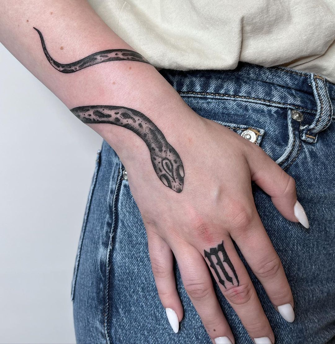 Black and White Abstract Tattoo on Middle Finger