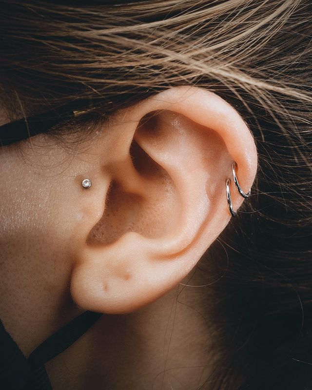 Forward Helix Piercing with Hoops on the Helix