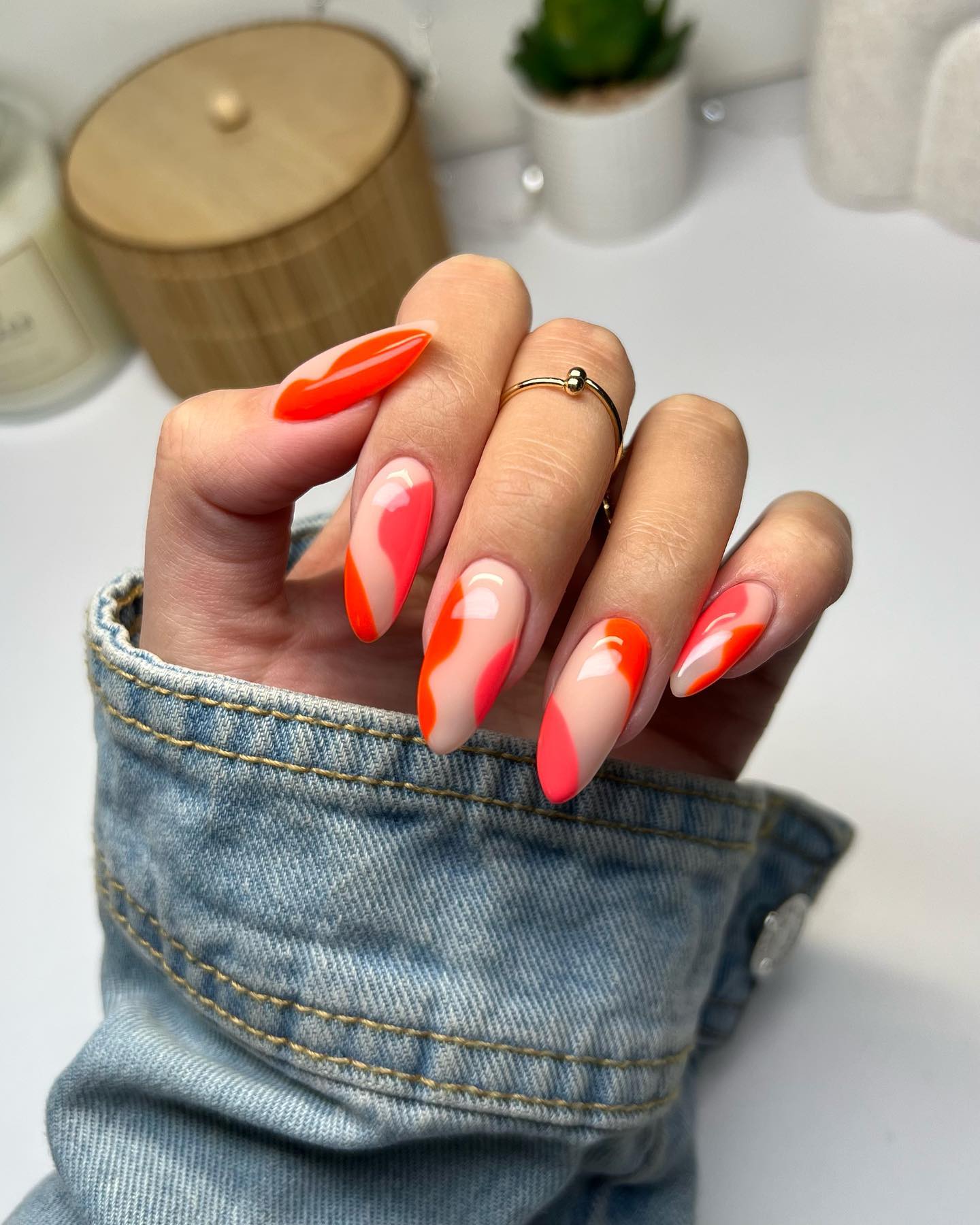 Nude Oval Nails with Red Swirls