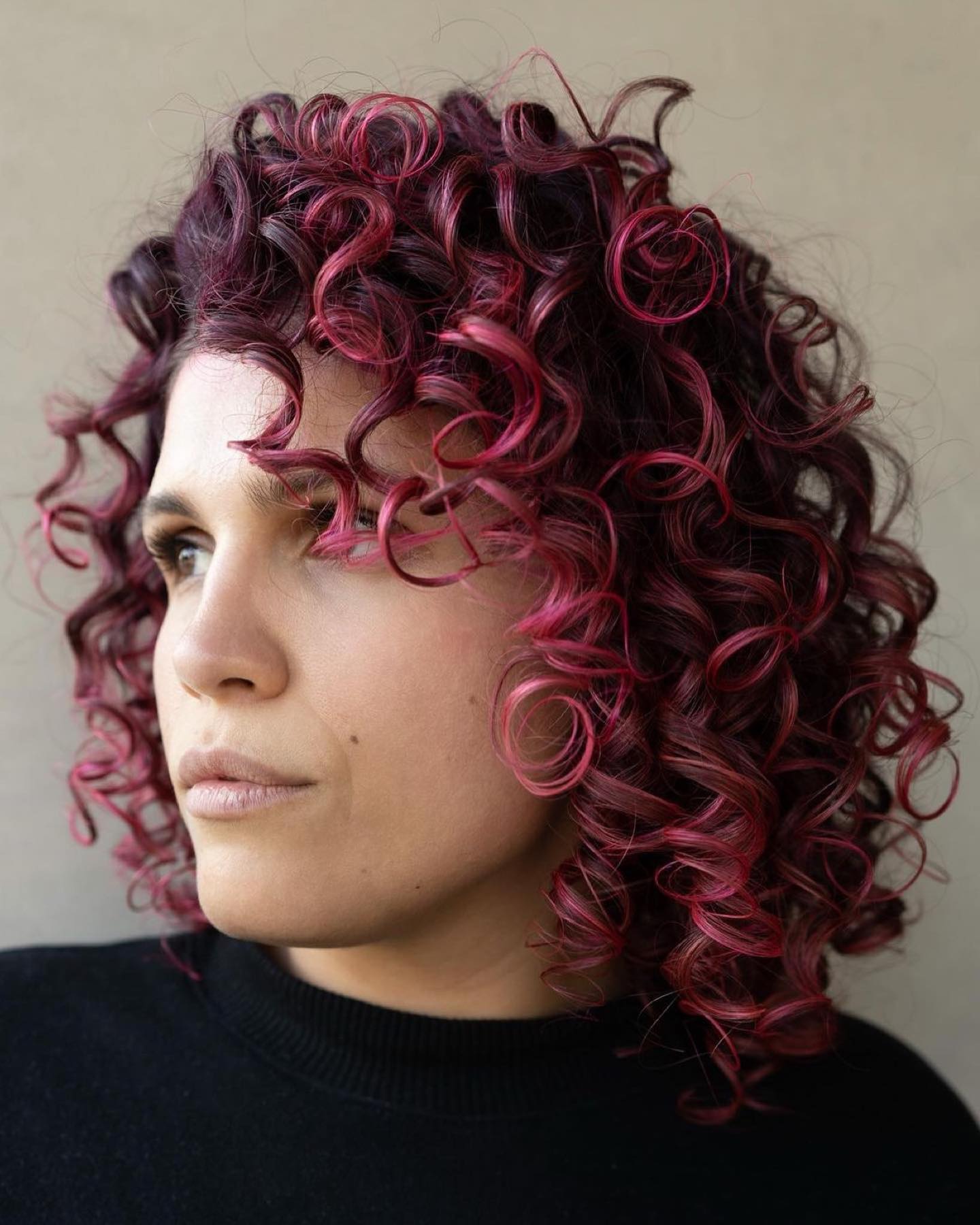 Pink Highlights on Short Curly Hair