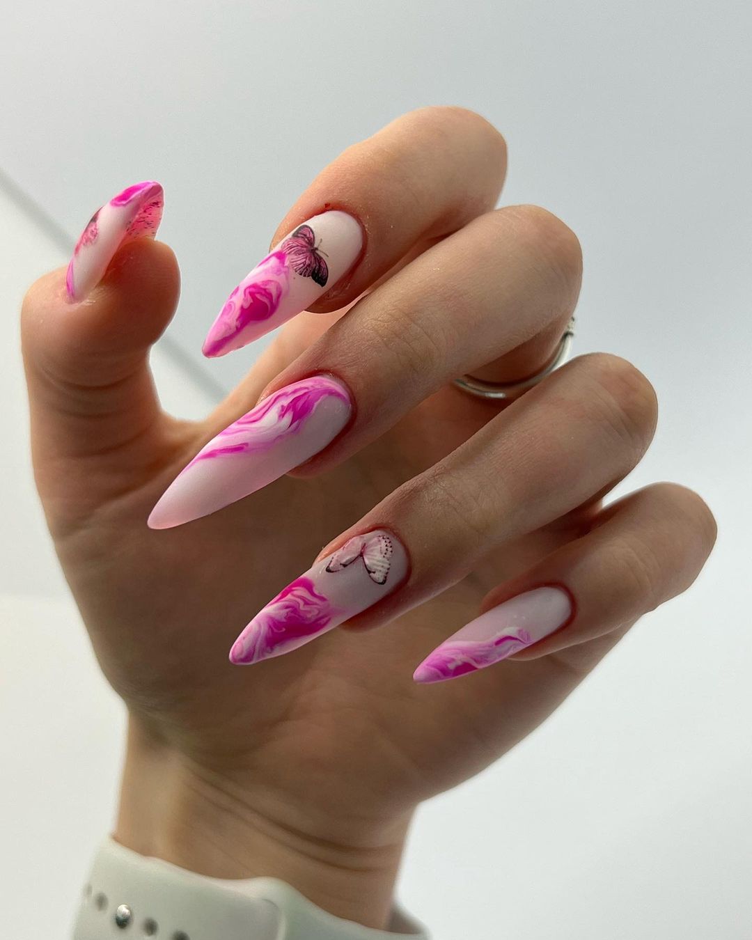 Stiletto Hot Pink Nails with Marble Design