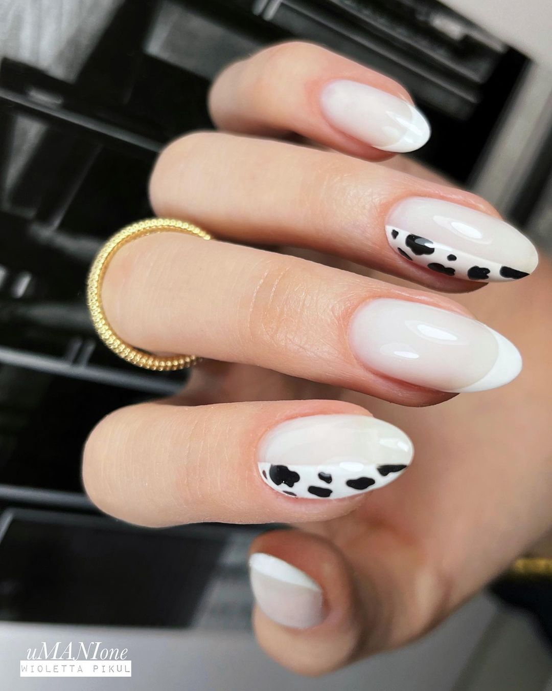 White Base Nails with Cow Print Design