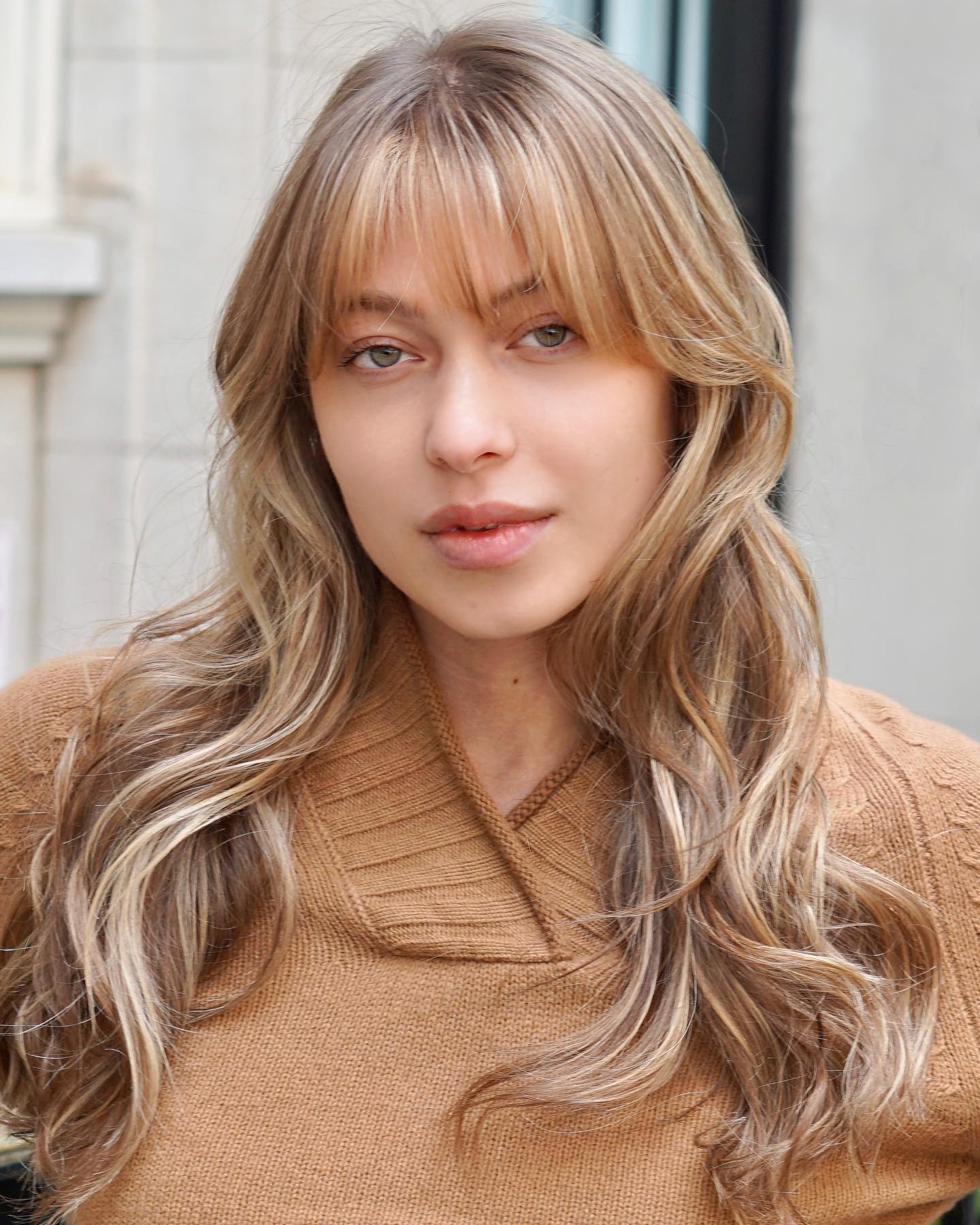 Long Wavy Hairstyle With Straight Bangs