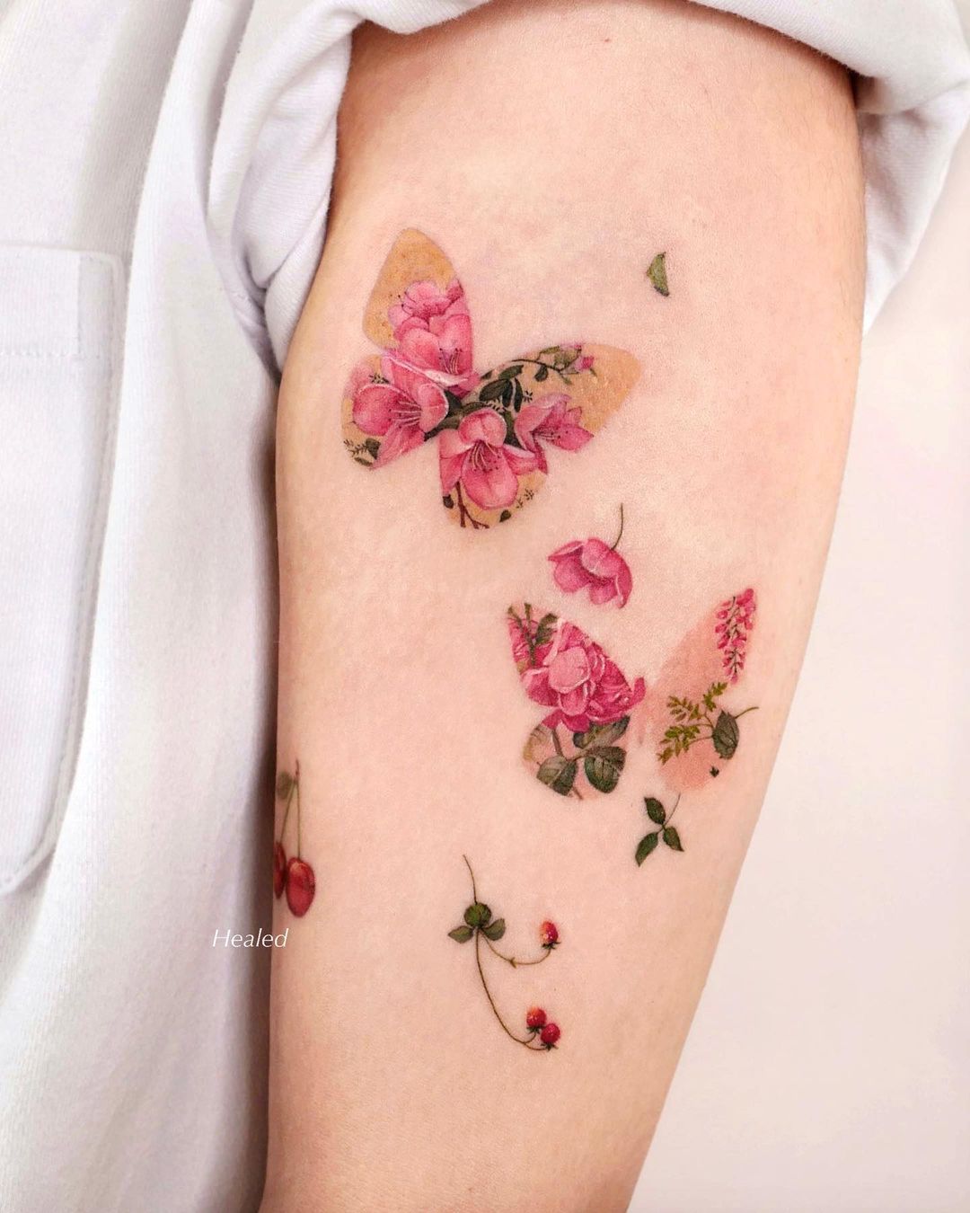 Red Flowers and Butterfly Tattoo on Arm