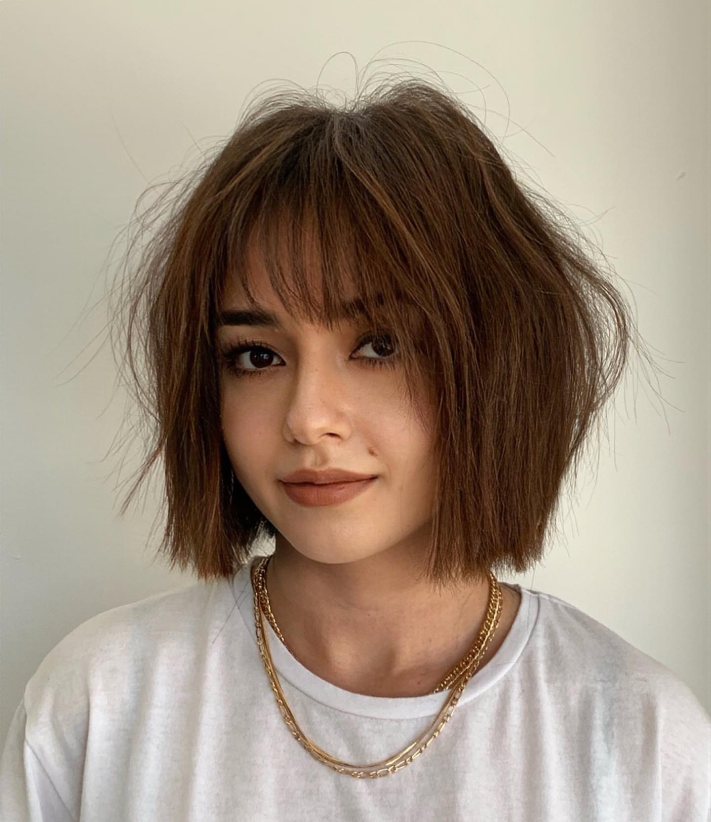 Short Brown Hair with Wispy Bang