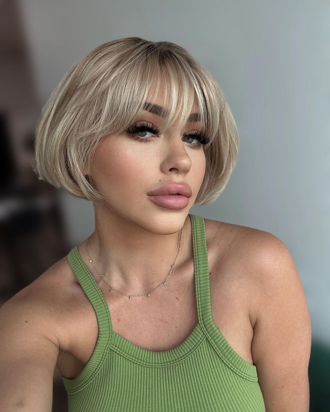 Short French Bob Cut on Thick Blonde Hair