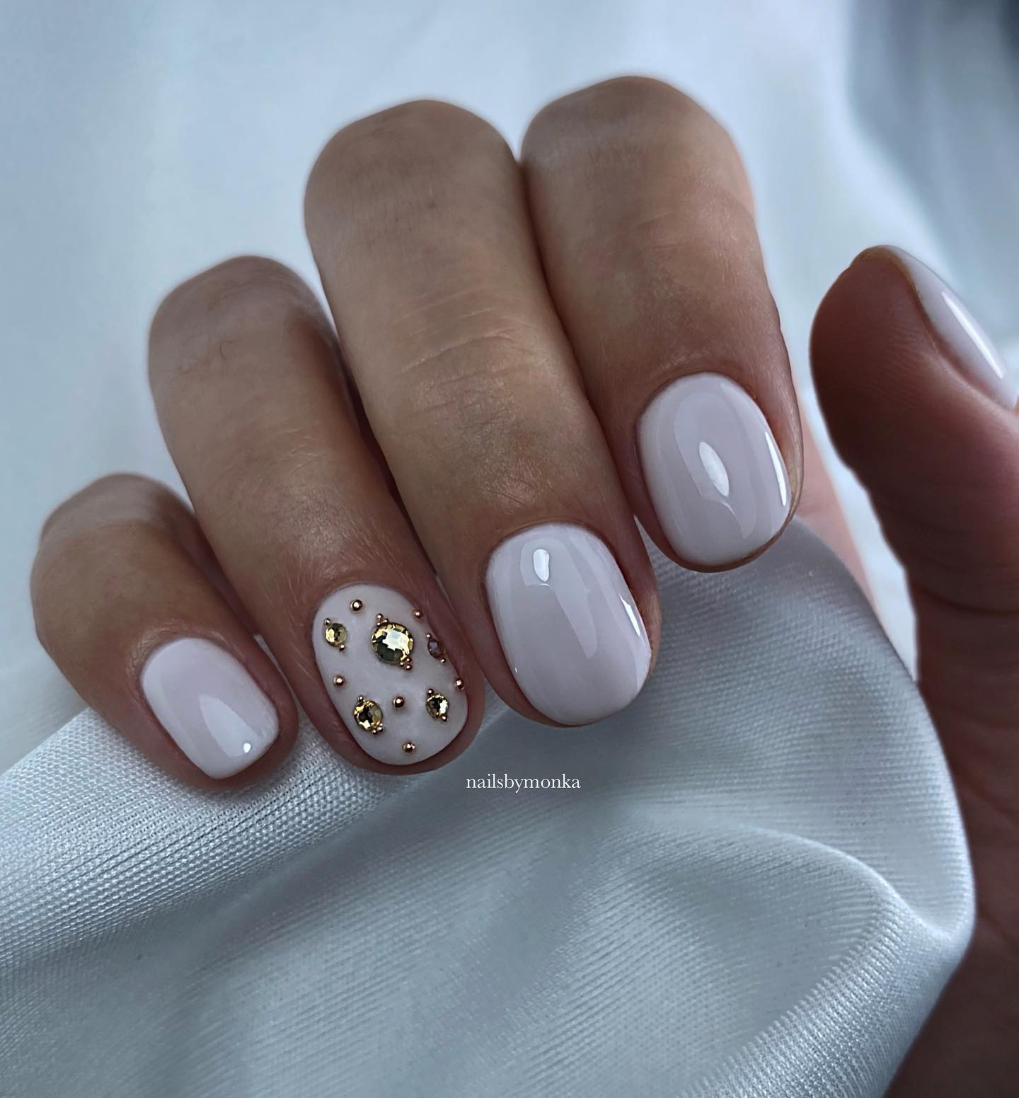 Short White Nails with Rhinestones on Accent Nail