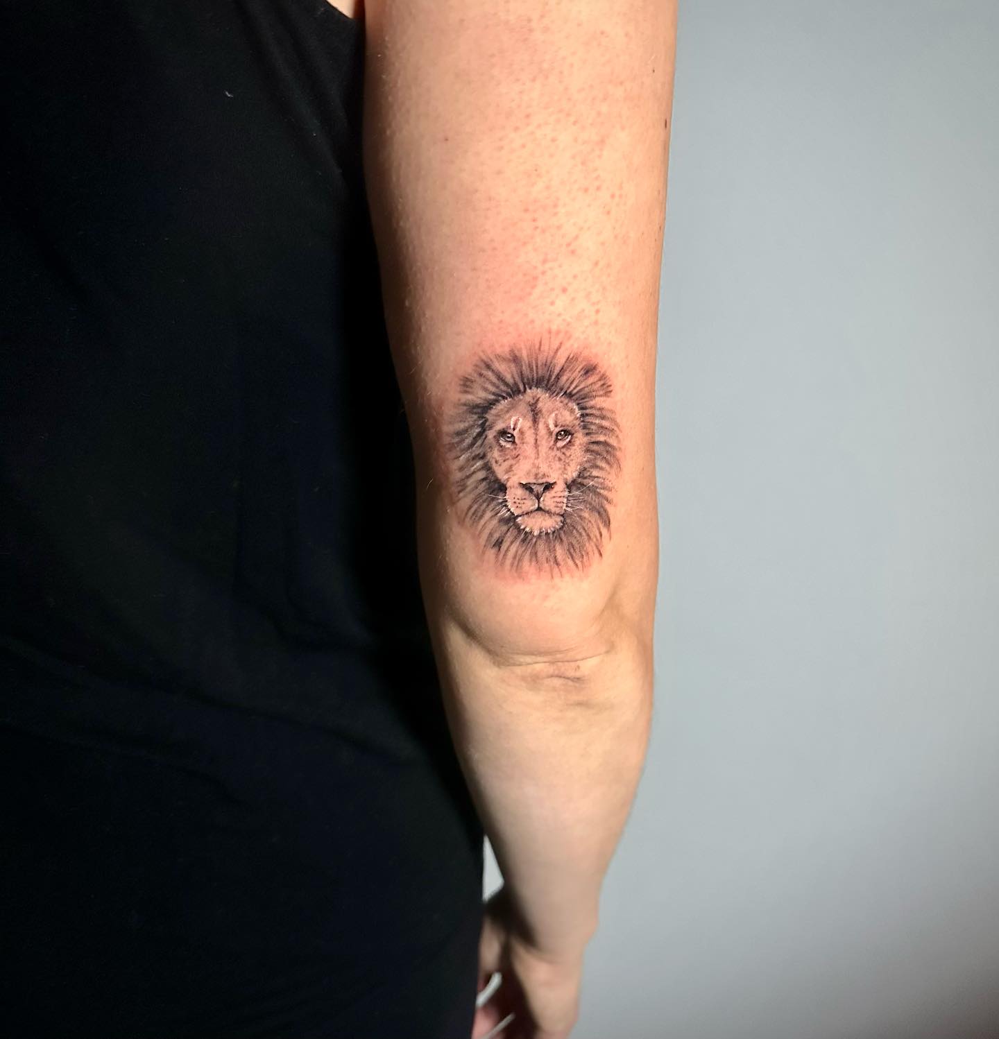 Small Lion Head Tattoo