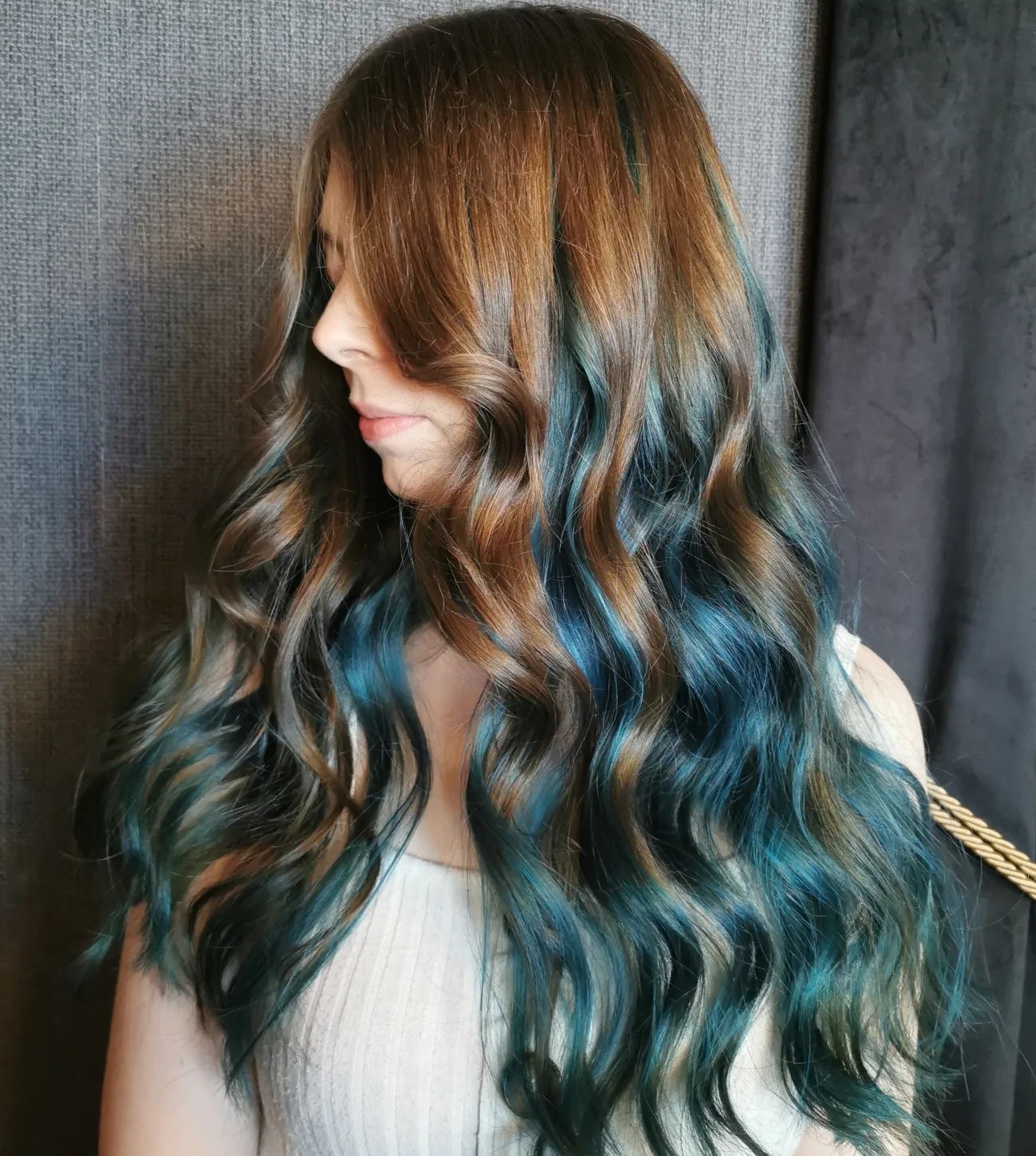 Teal Peekaboo on Long Wavy Light Brown Hair