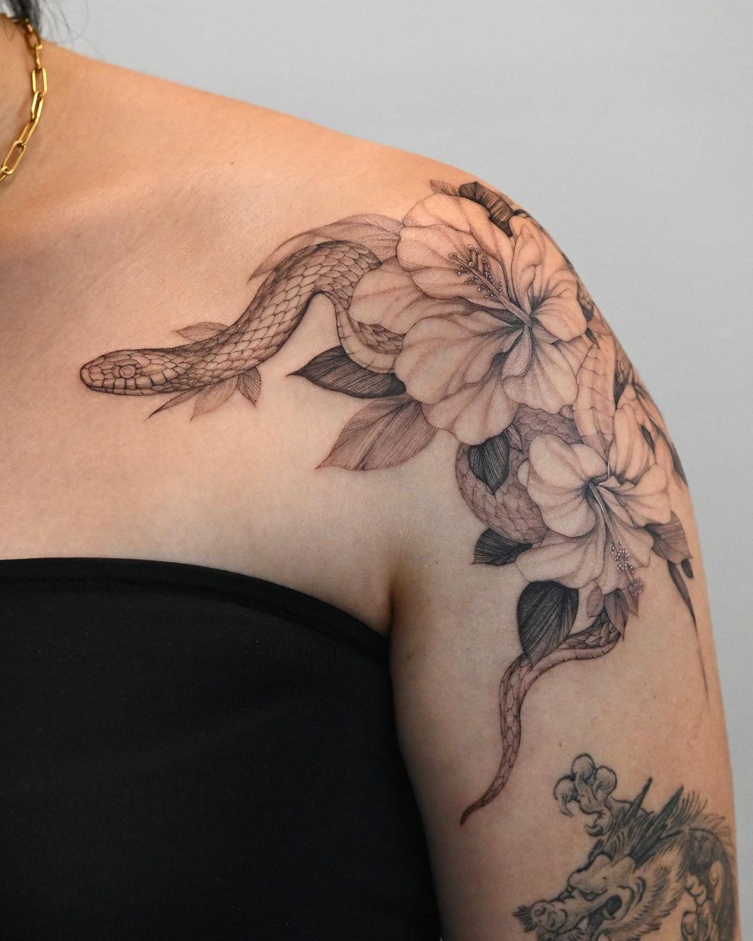 Black and White Hibiscus Flower Tattoo with Snake on Shoulder
