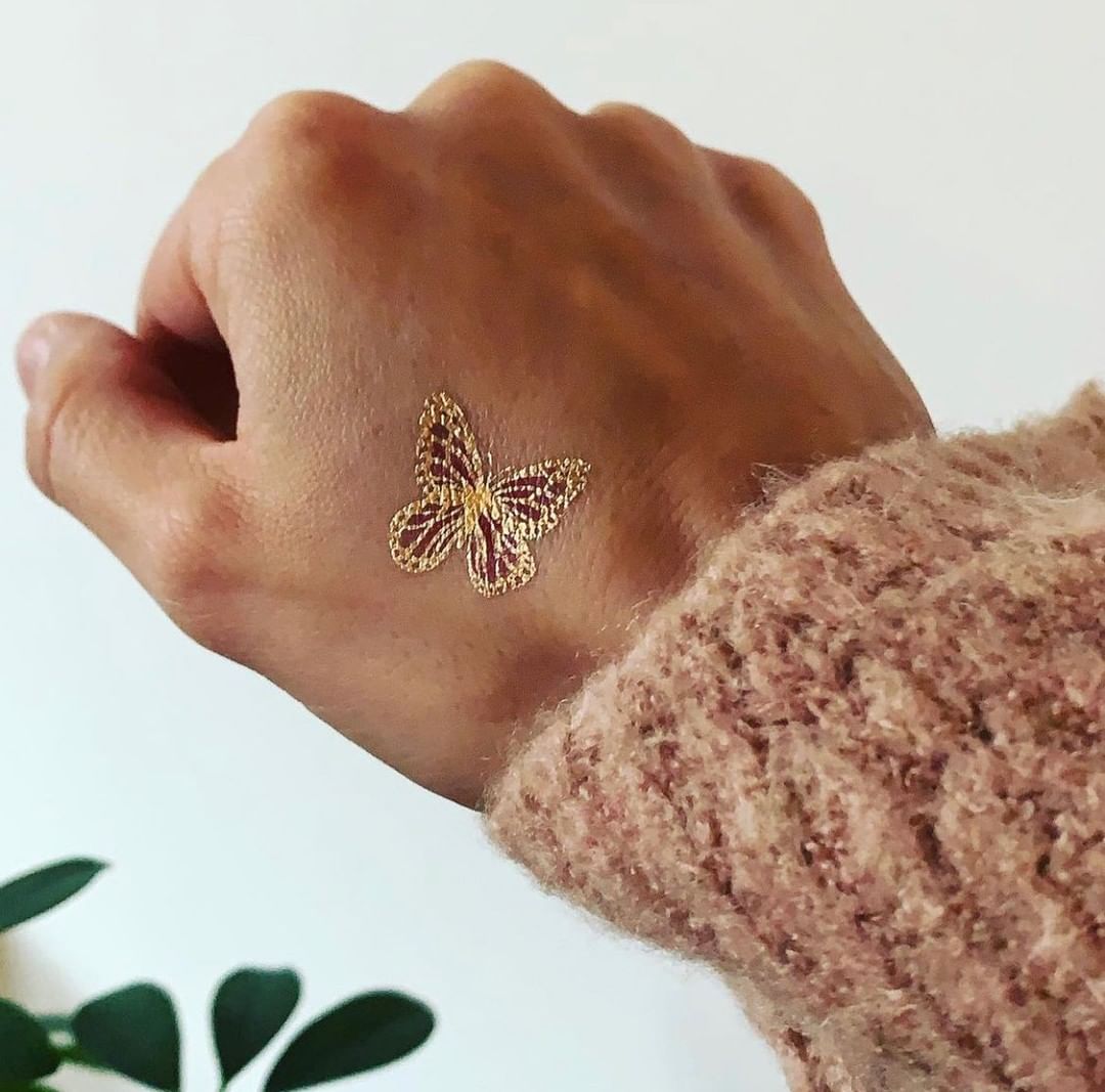 Butterfly Glitter Tattoo on Wrist